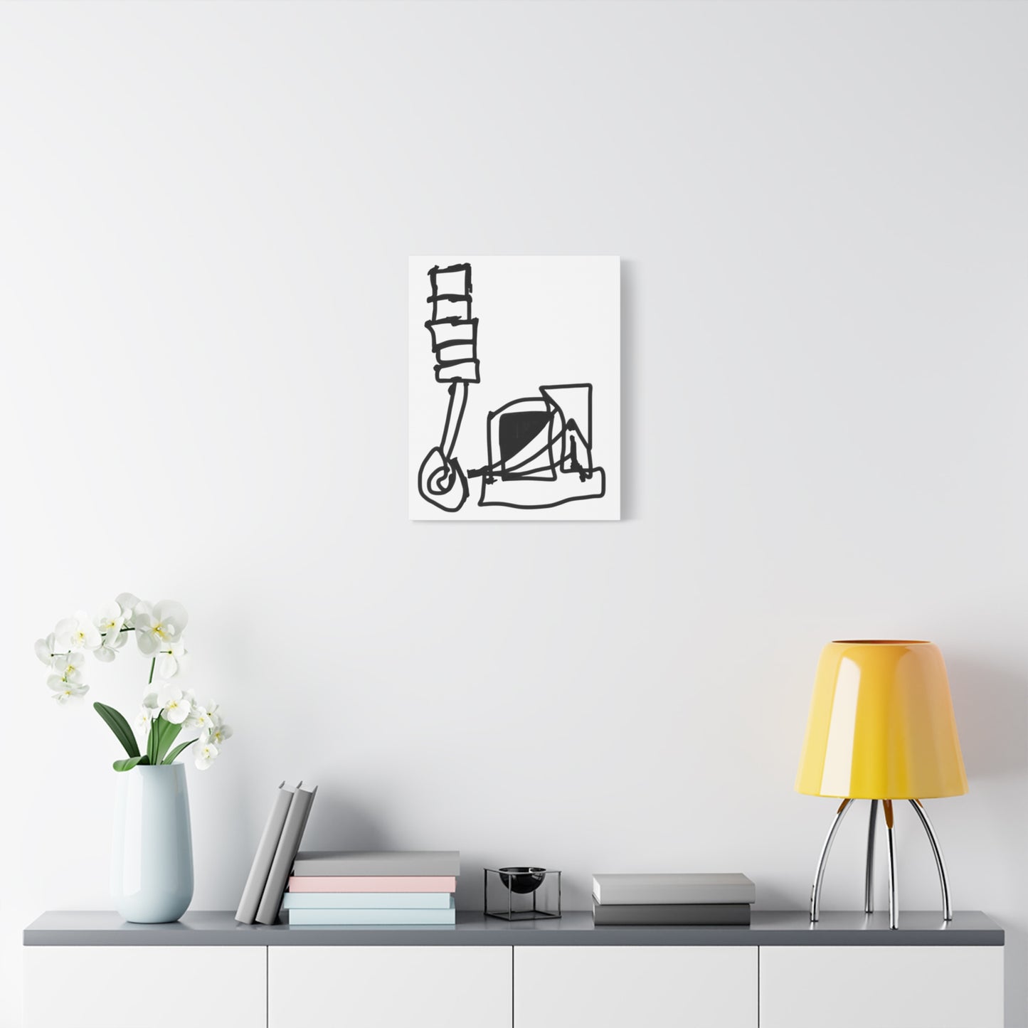 Framed abstract art canvas titled ‘Crank’ displayed against concrete wall, showcasing colorful layered design in a minimalist interior.