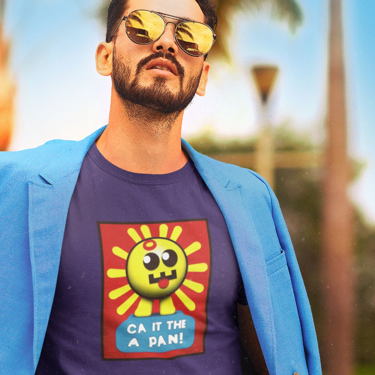 Cool guy man wearing a blue jacket and sunglasses with a purple t-shirt featuring a sun graphic and text.