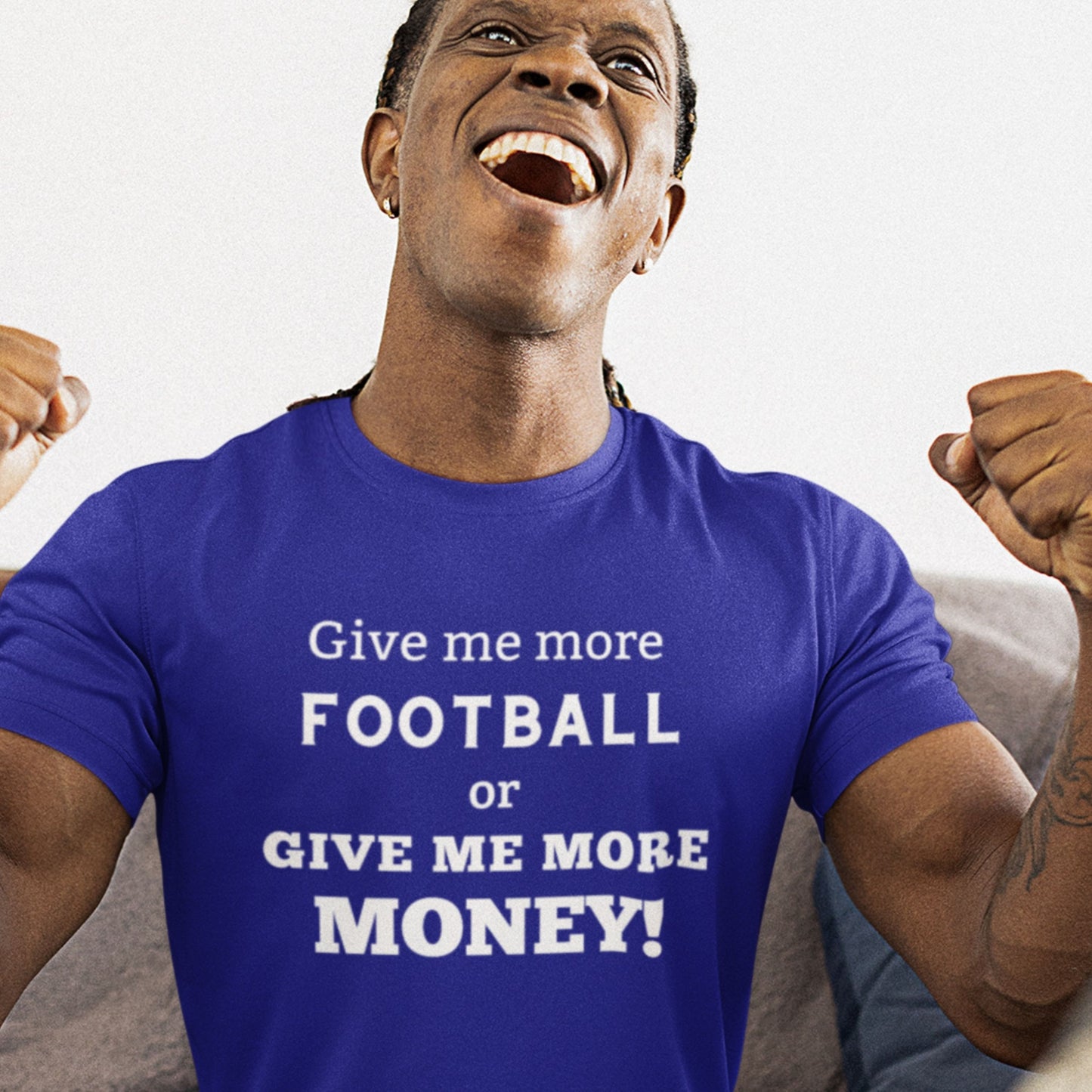 Man wearing a blue t-shirt with text 'Give me more football or give me more money!' on a white background.