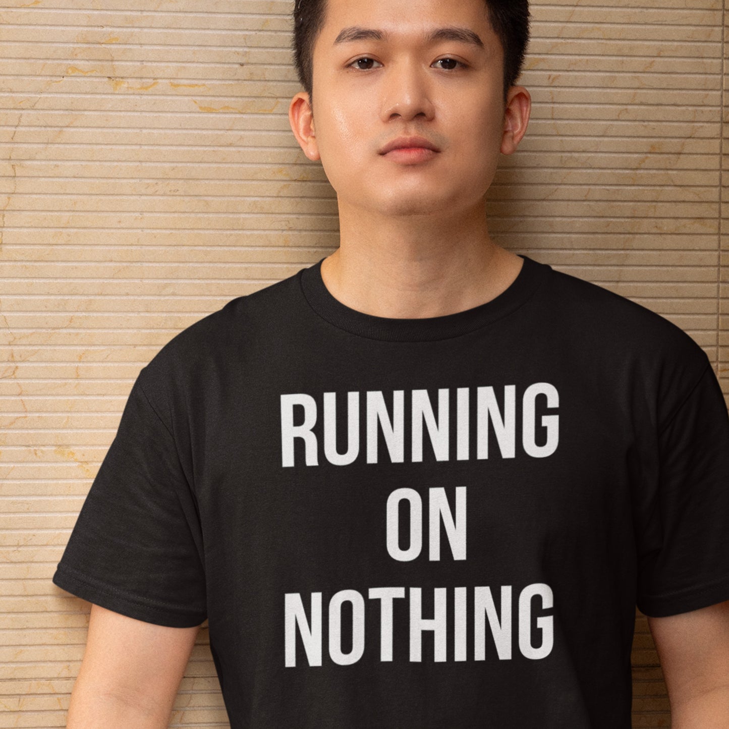 Running on nothing text t-shirt black minimalist design model
