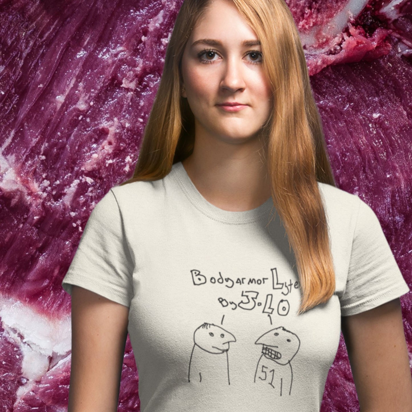 Woman wearing a natural color t-shirt with a line drawing in front of a giant meat.