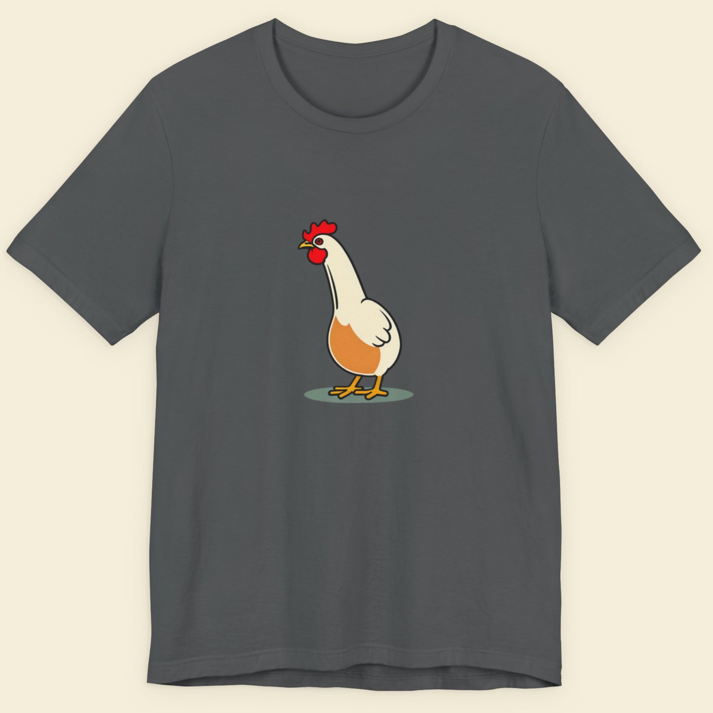Gray t-shirt with a cartoon chicken design on a beige background