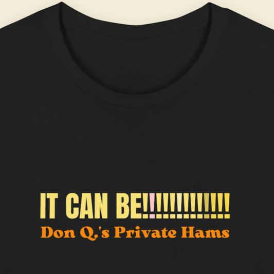 Black t-shirt with yellow and orange text on a beige background.