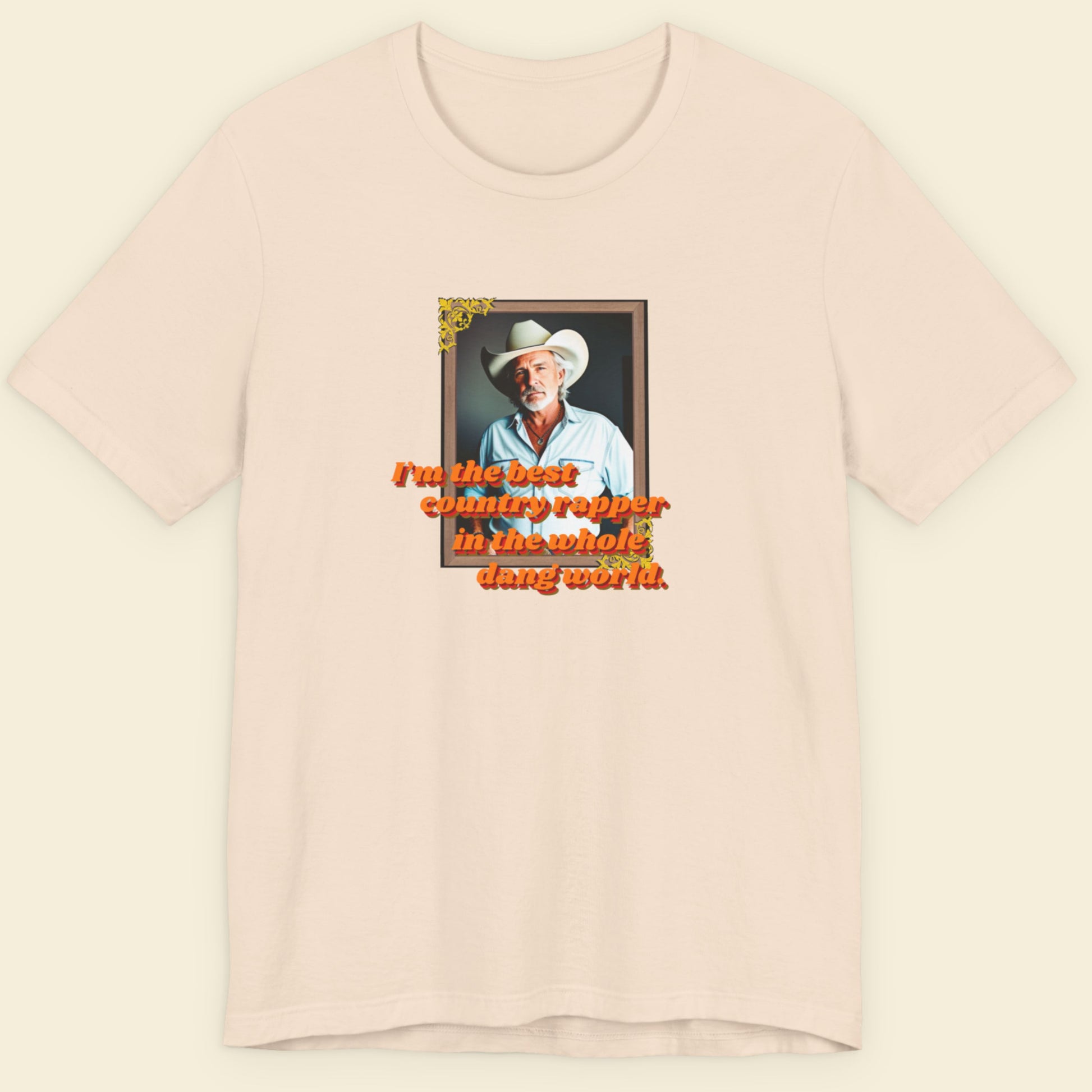Beige t-shirt with a graphic of a man in a cowboy hat and text on a beige background