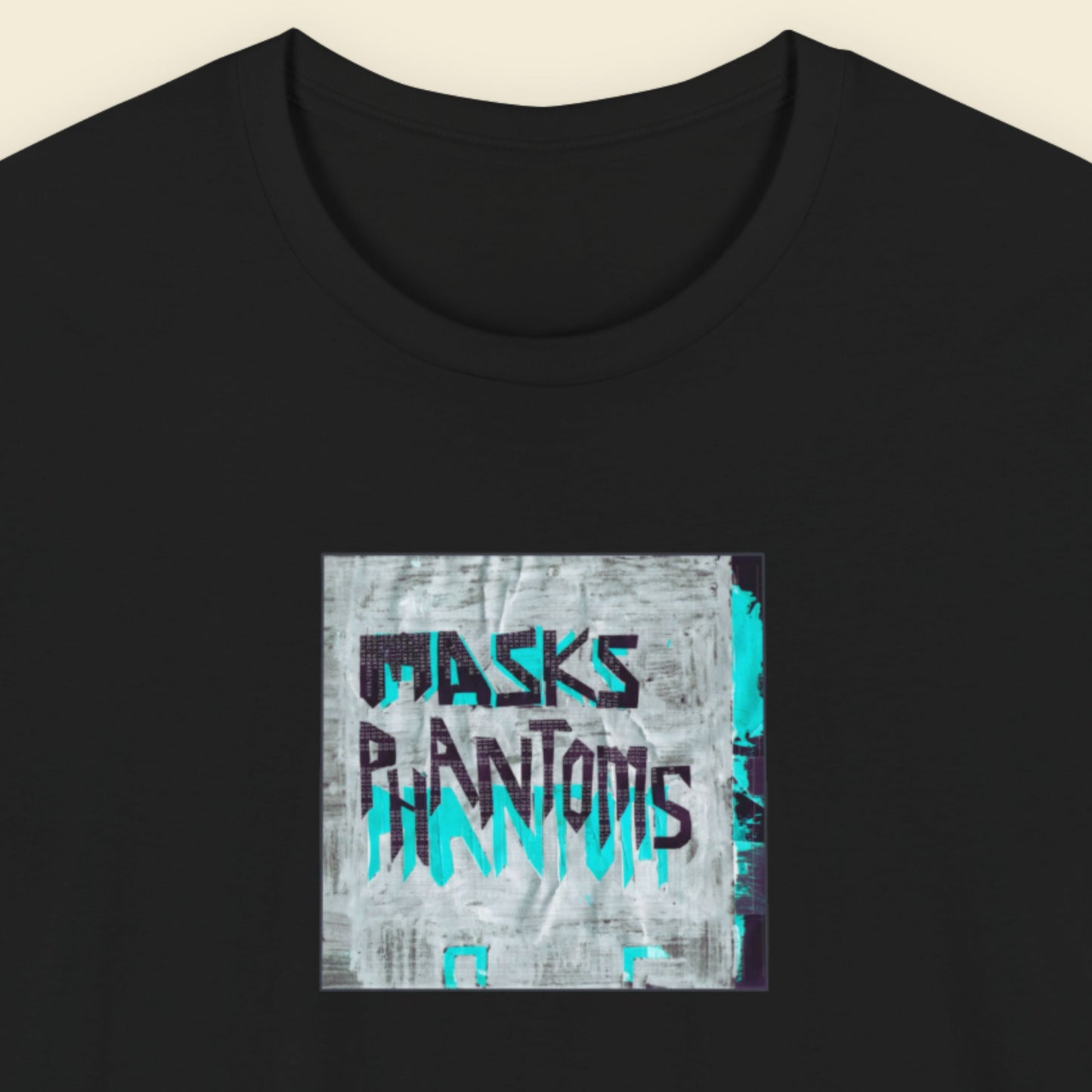 black shirt featuring the debut album cover from masks phantoms