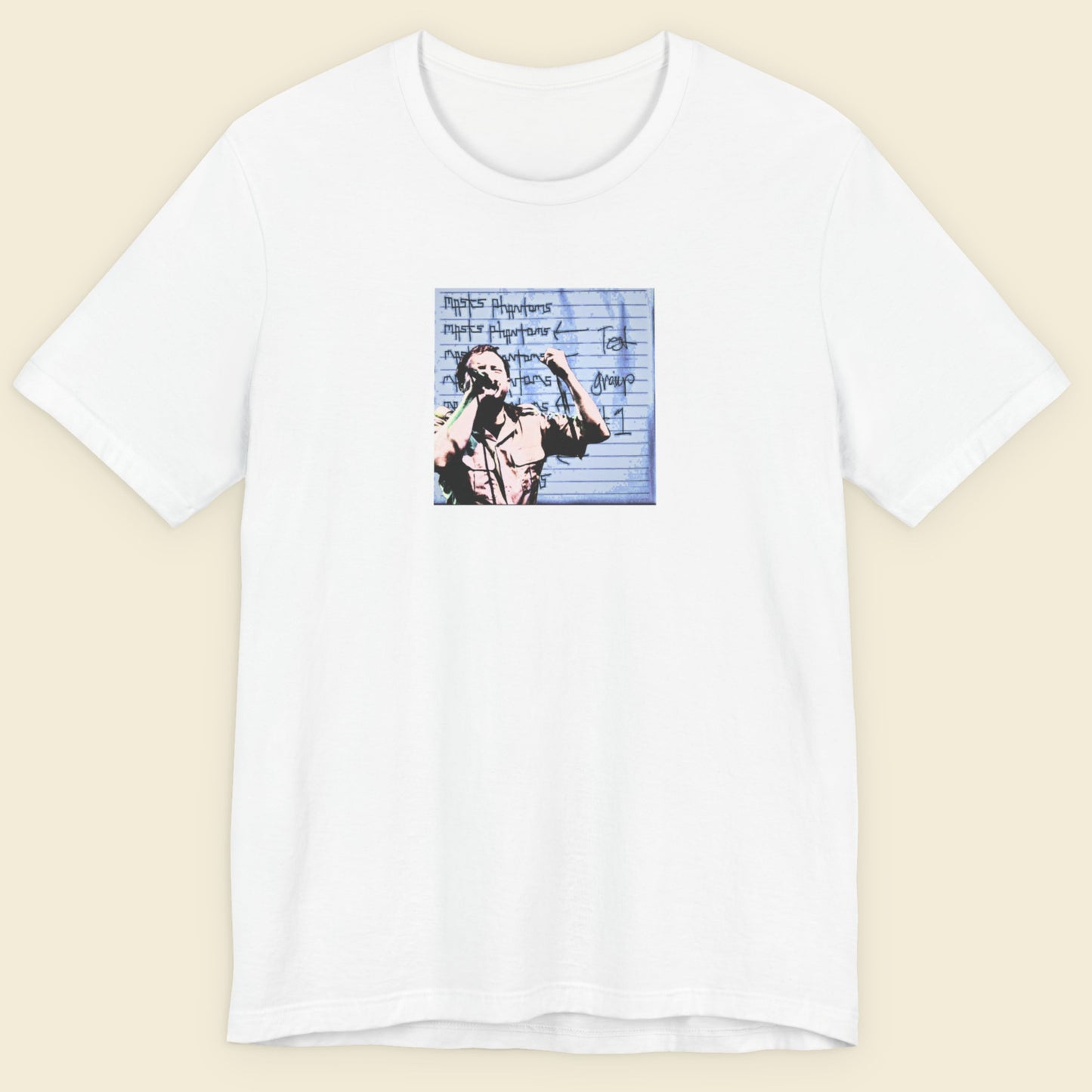 White t-shirt with graphic design on a beige background