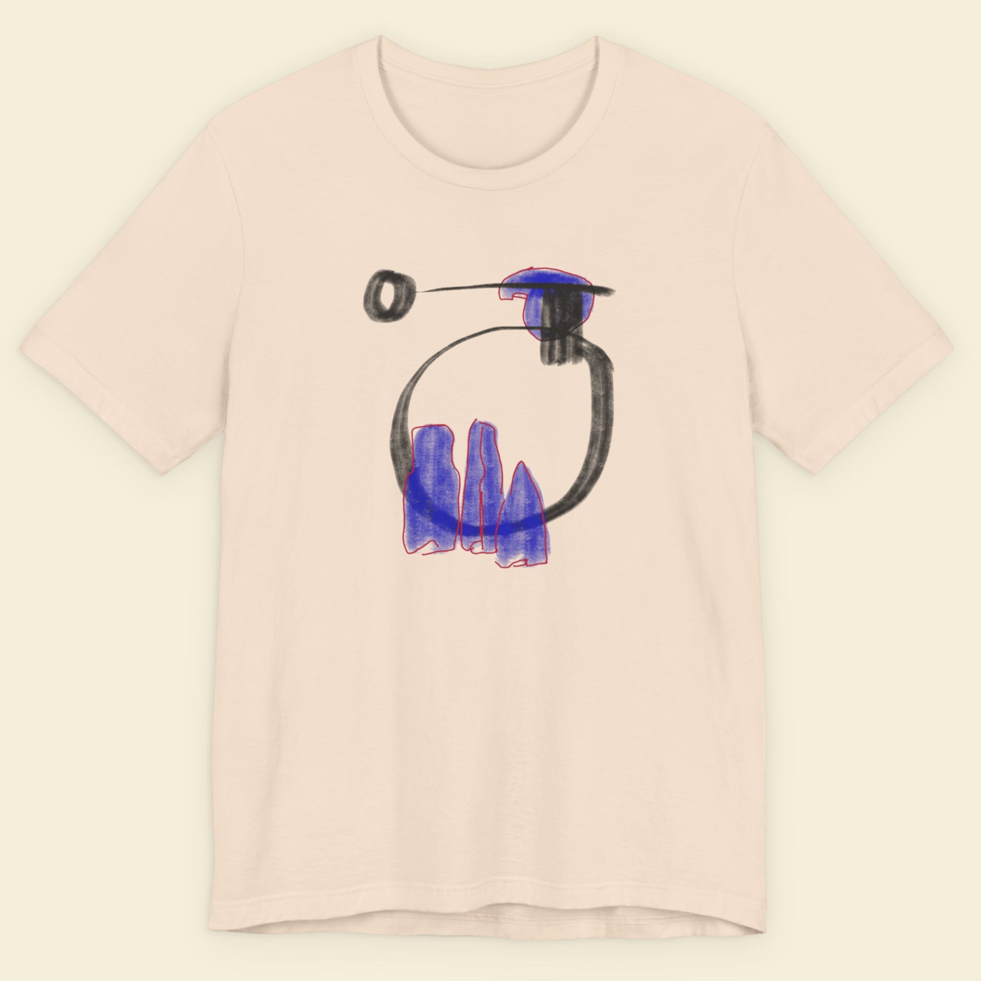 Beige t-shirt with a colorful abstract drawing on a beige background.