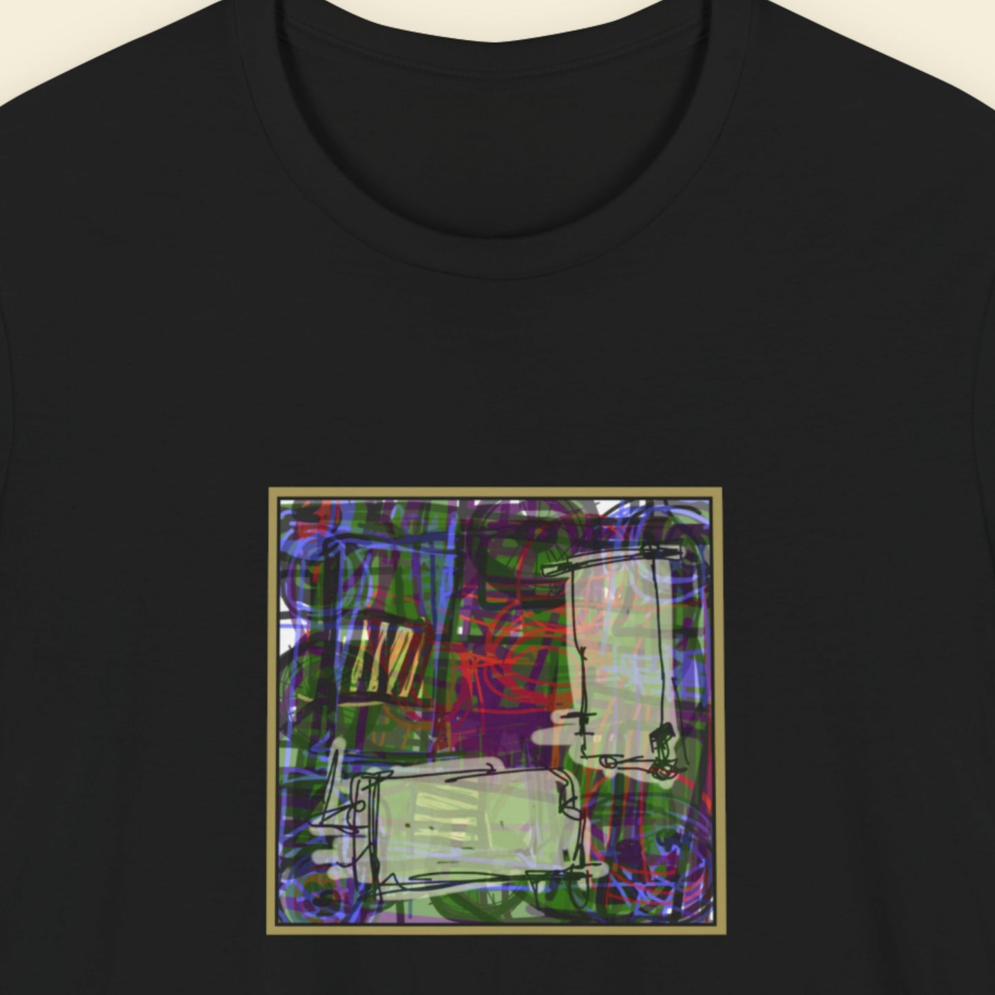 Black t-shirt with a colorful abstract design on a beige background.