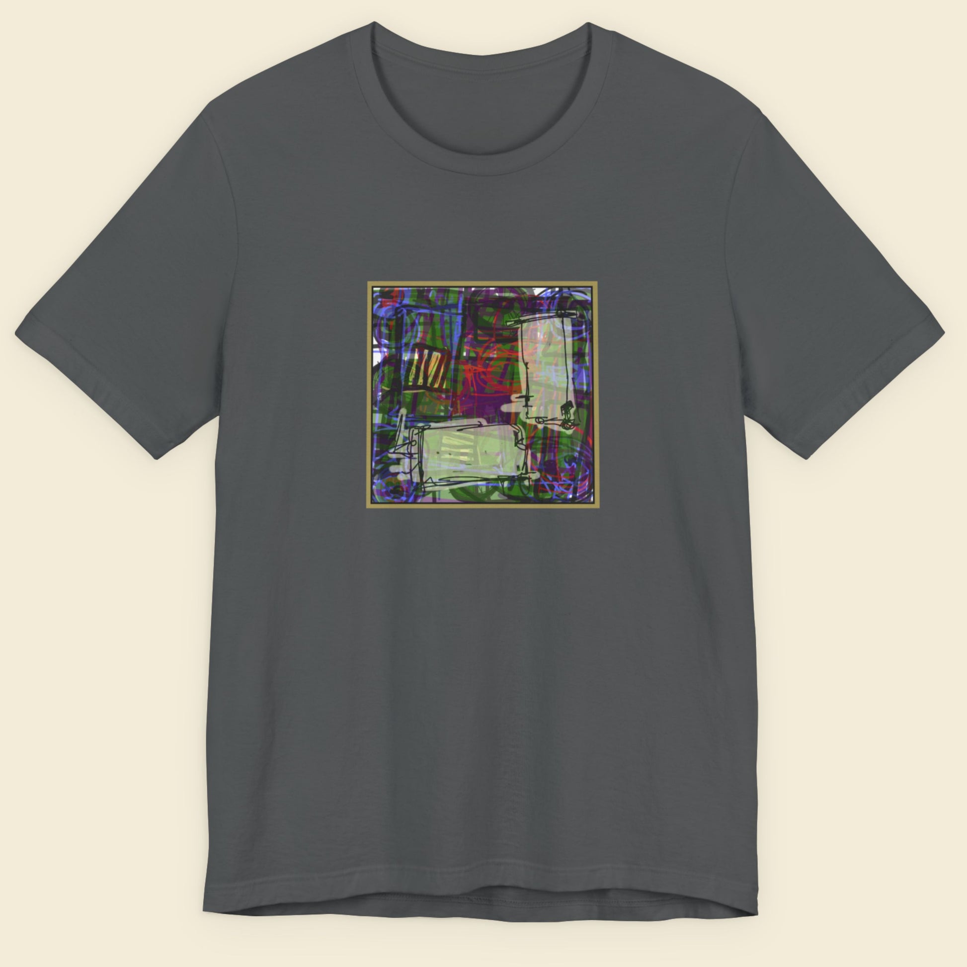 Gray t-shirt with a colorful abstract design on a beige background.