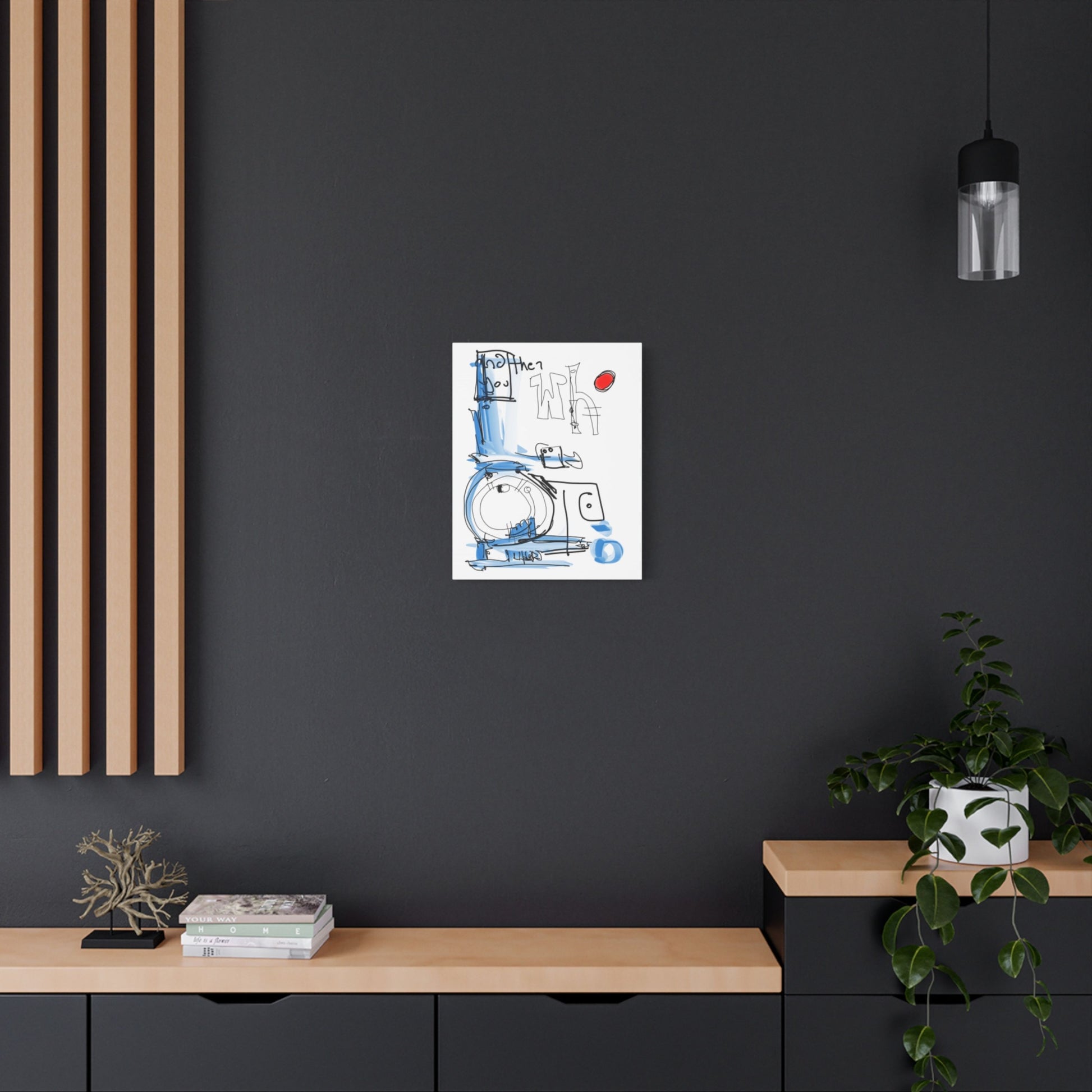 Colorful abstract artwork on a black wall with a wooden shelf and plant below.