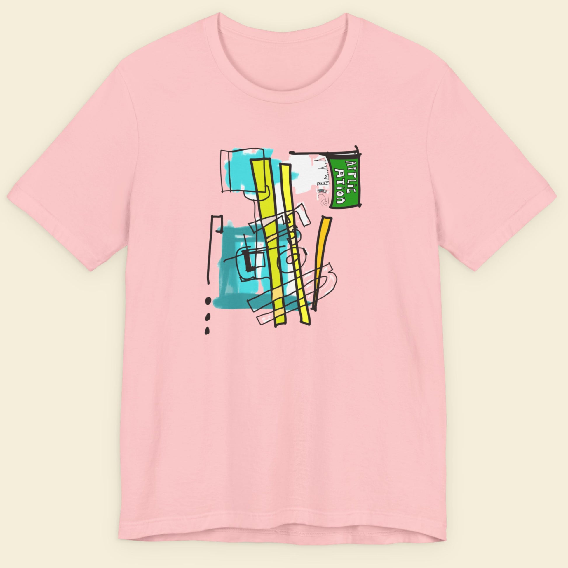 Pink t-shirt with a colorful abstract drawing on a beige background.