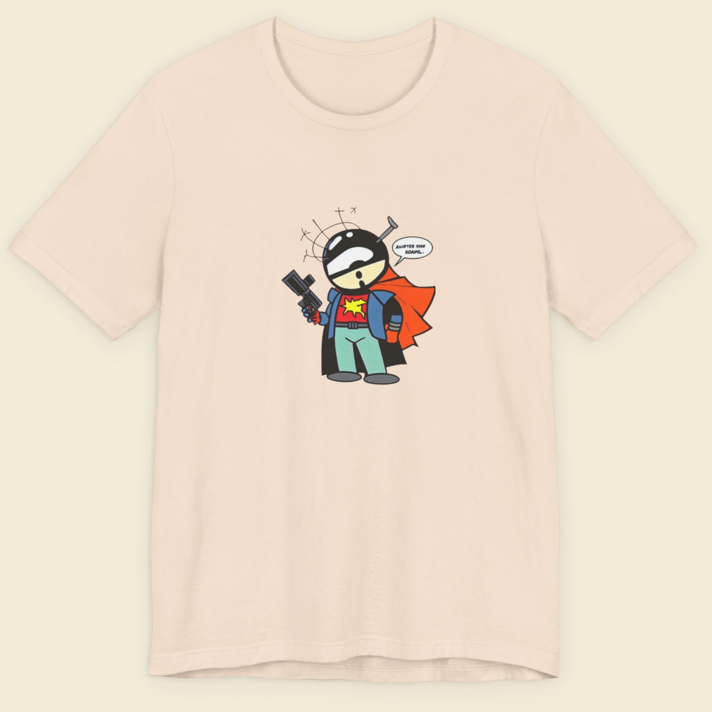 Beige shirt with a fun, colorful cartoon illustration on a beige background.