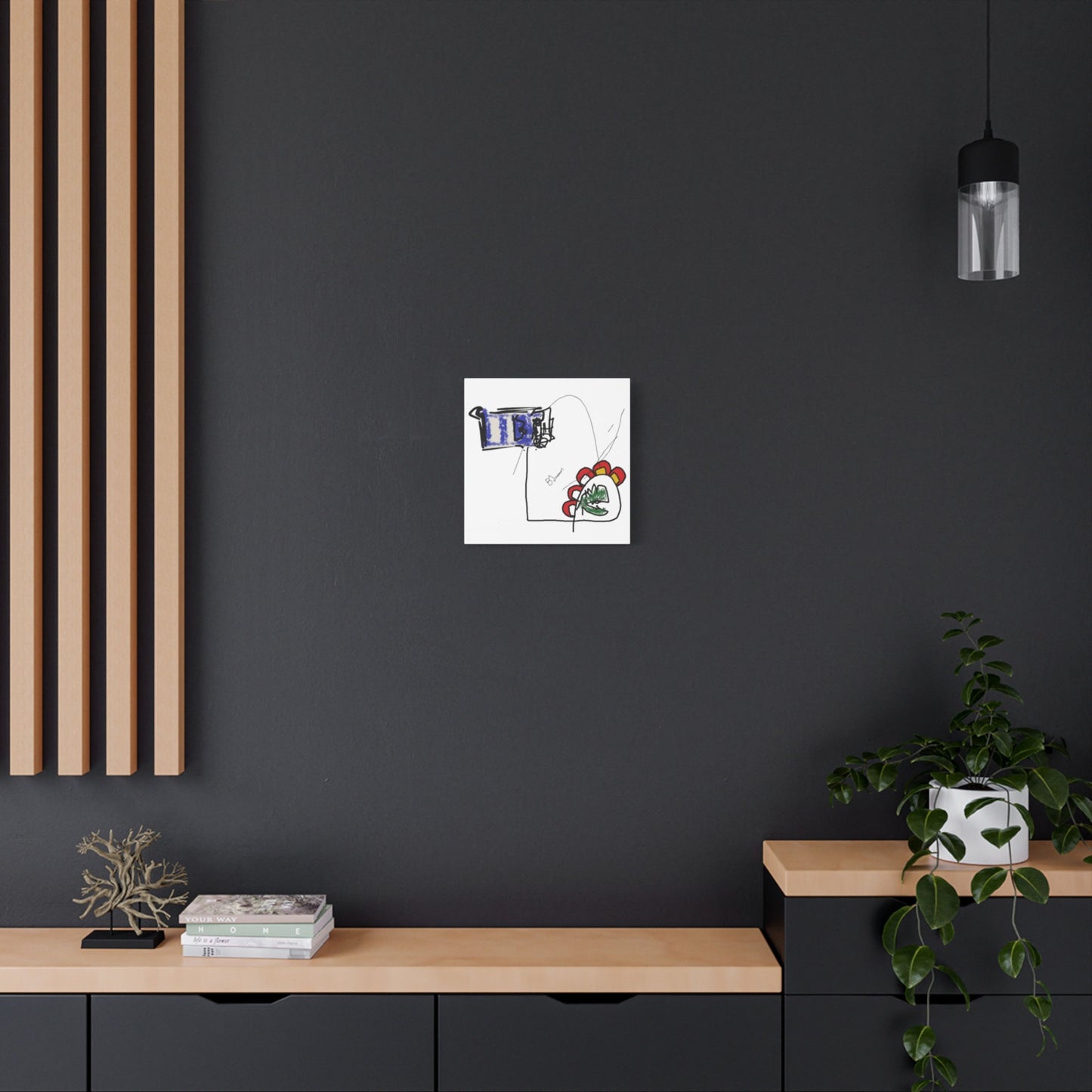 Abstract artwork in modern interior with a black wall, wooden shelf, and decorative items.