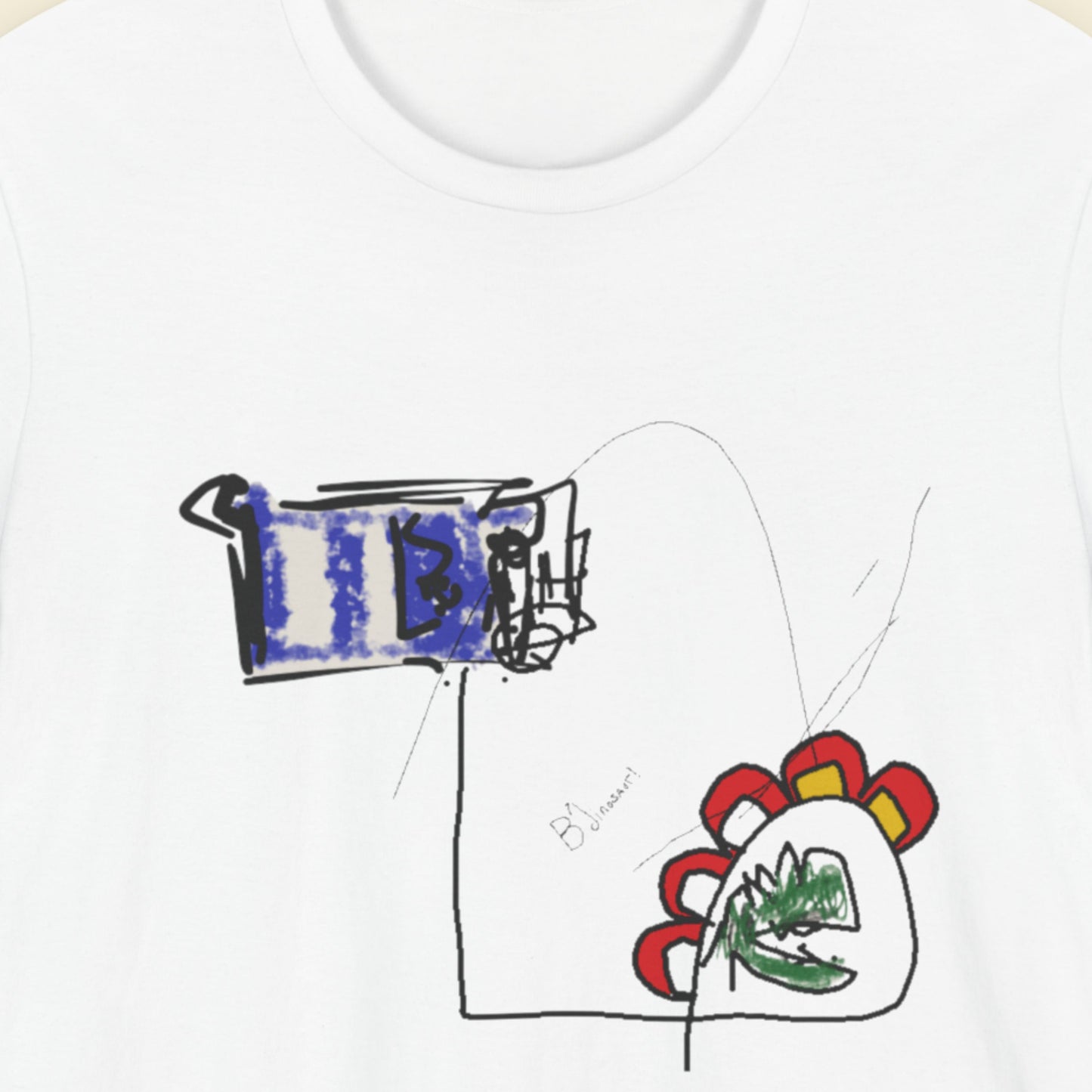 White t-shirt with a colorful abstract drawing.