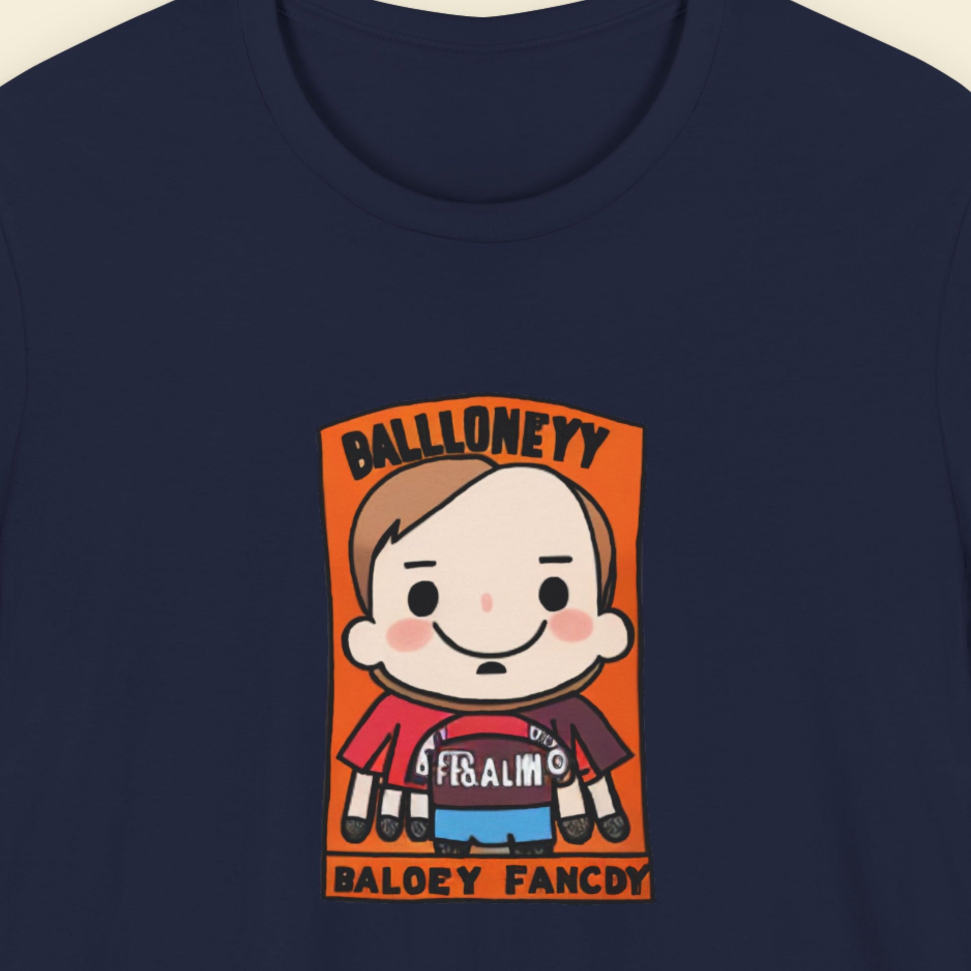 Navy blue t-shirt with a fun, colorful cartoon illustration on a beige background.