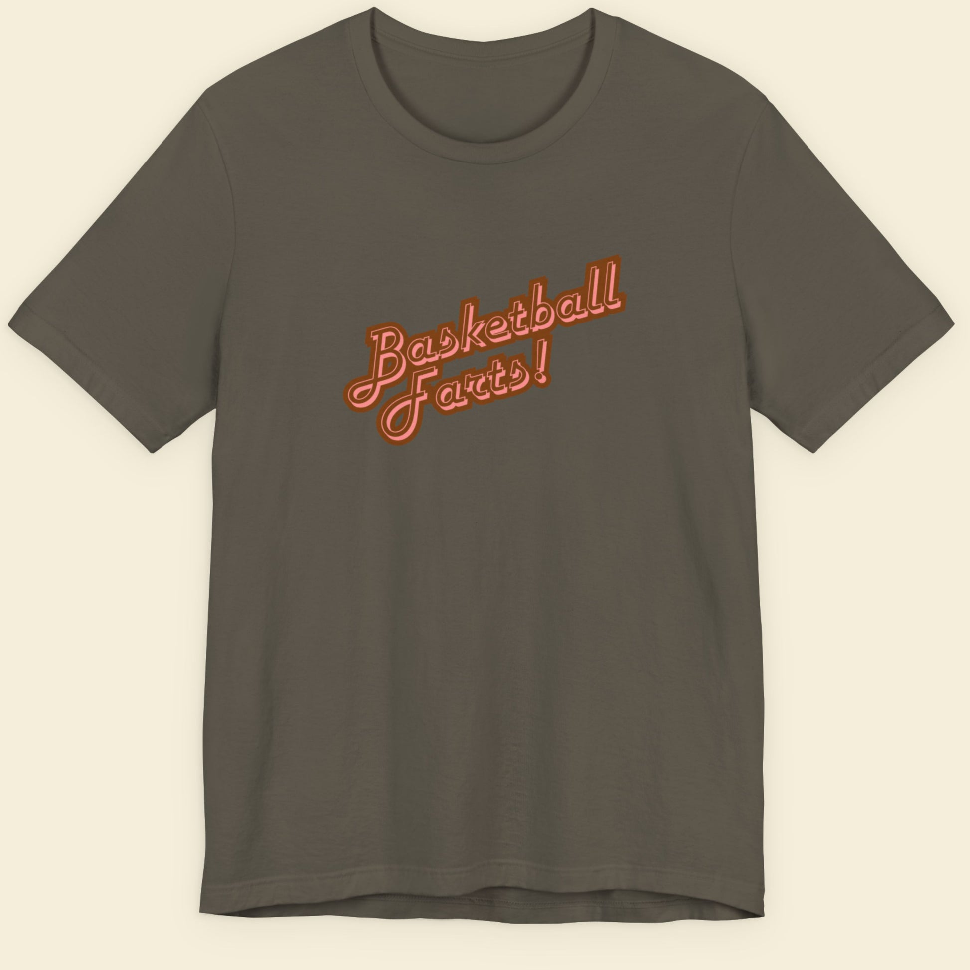 Brown t-shirt with two-tone red text reading 'Basketball Farts!' on a beige background.