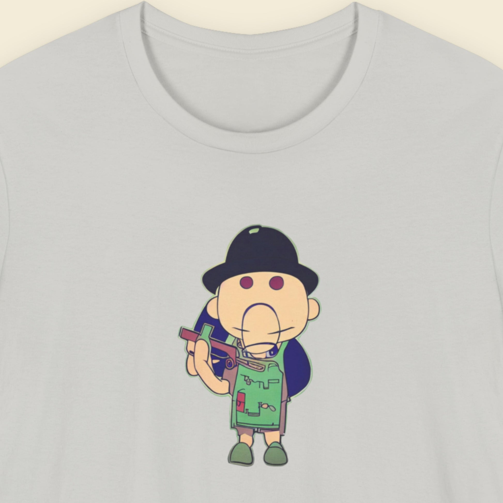 Grey t-shirt with a fun, colorful cartoon illustration on a beige background.