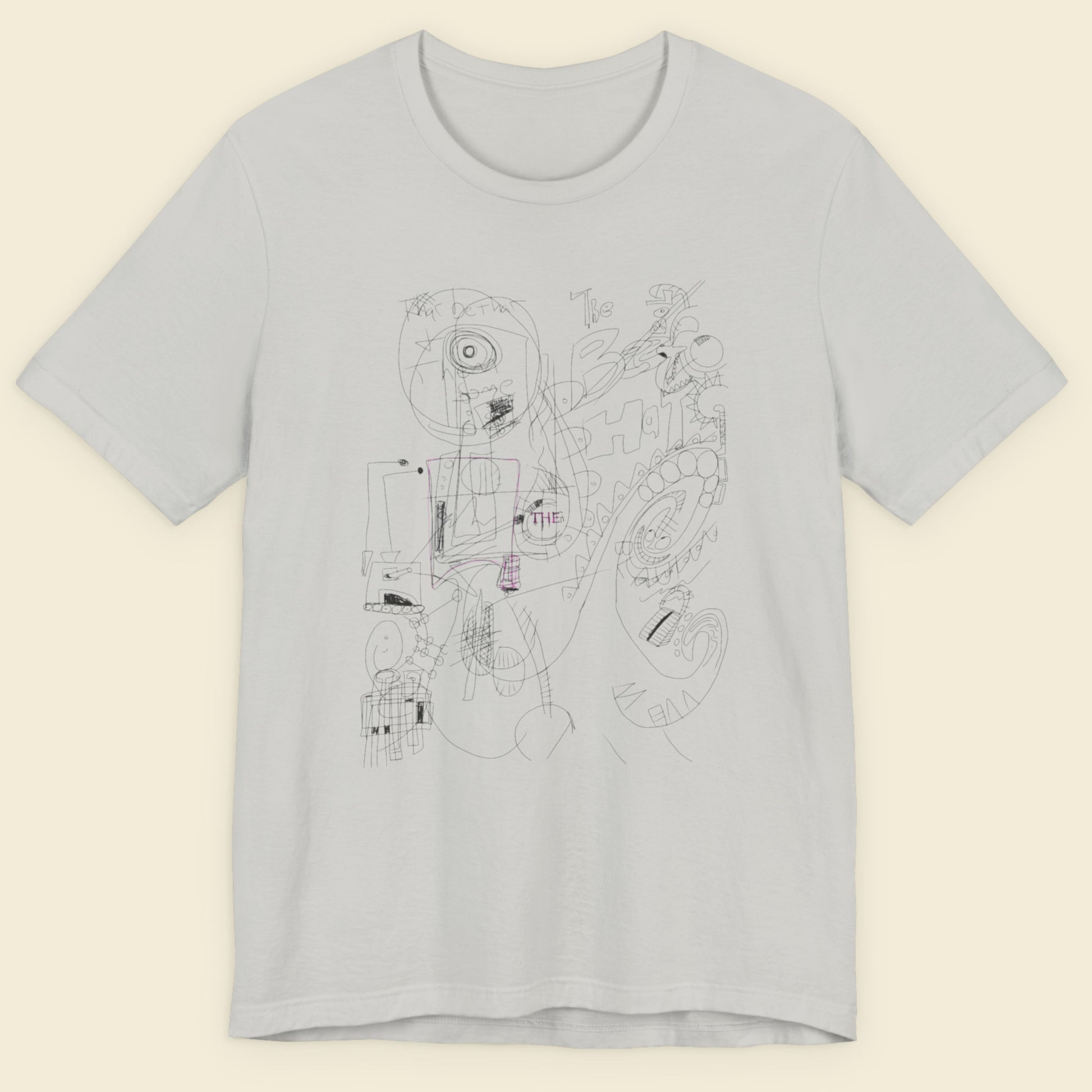 Light gray t-shirt with black line art design on a beige background.