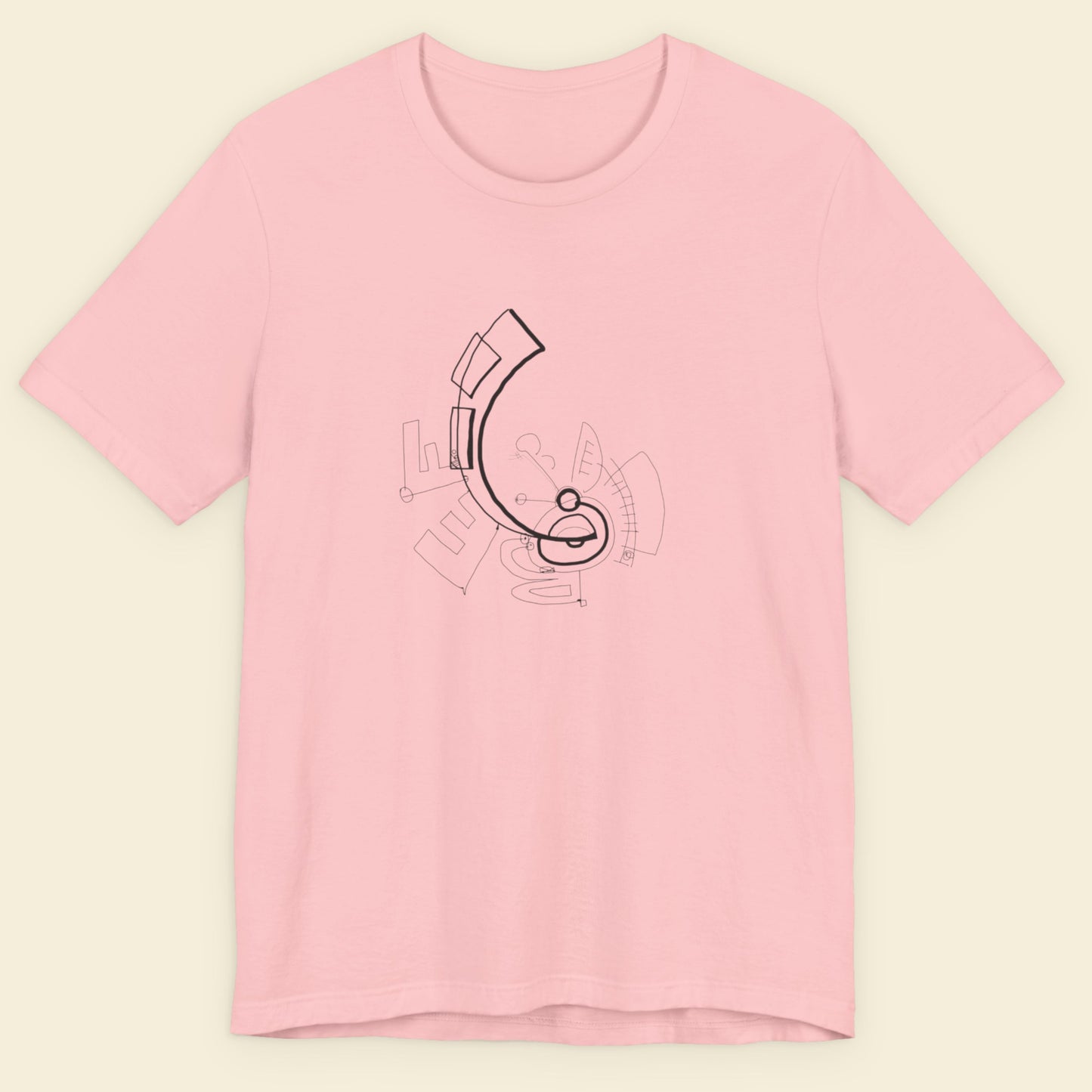Pink t-shirt with a black graphic design on a beige background.