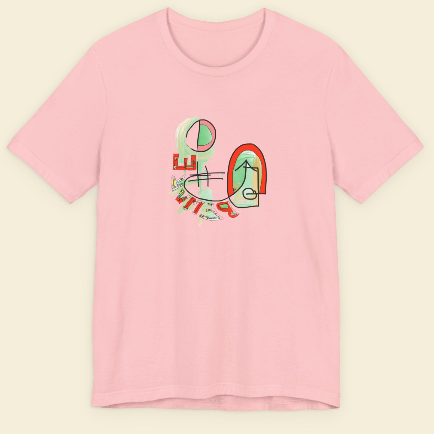 Pink t-shirt with colorful graphic design on a beige background.