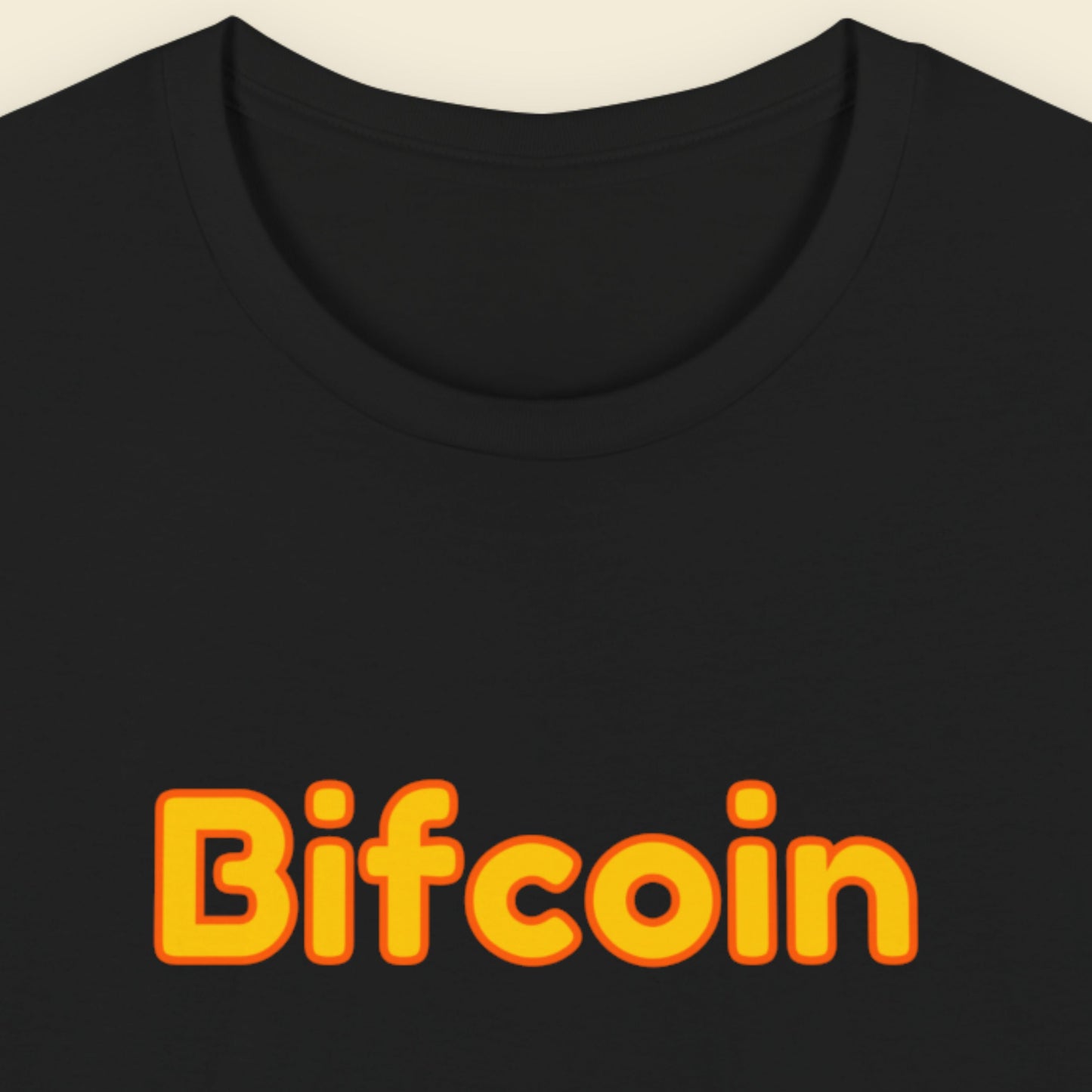 Black t-shirt with humorous colorful crypto text on a beige background.