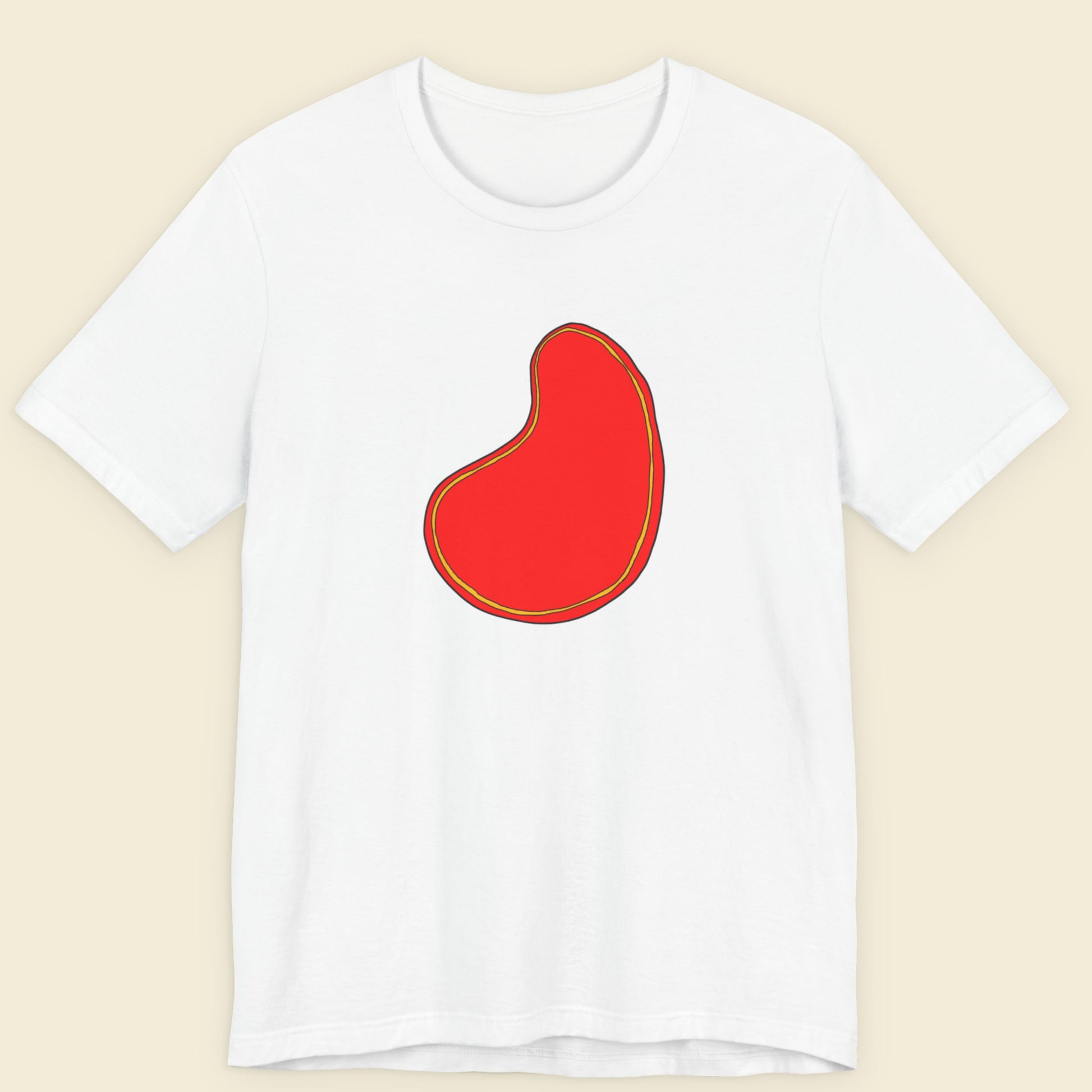 White t-shirt with a colorful abstract drawing on a beige background.
