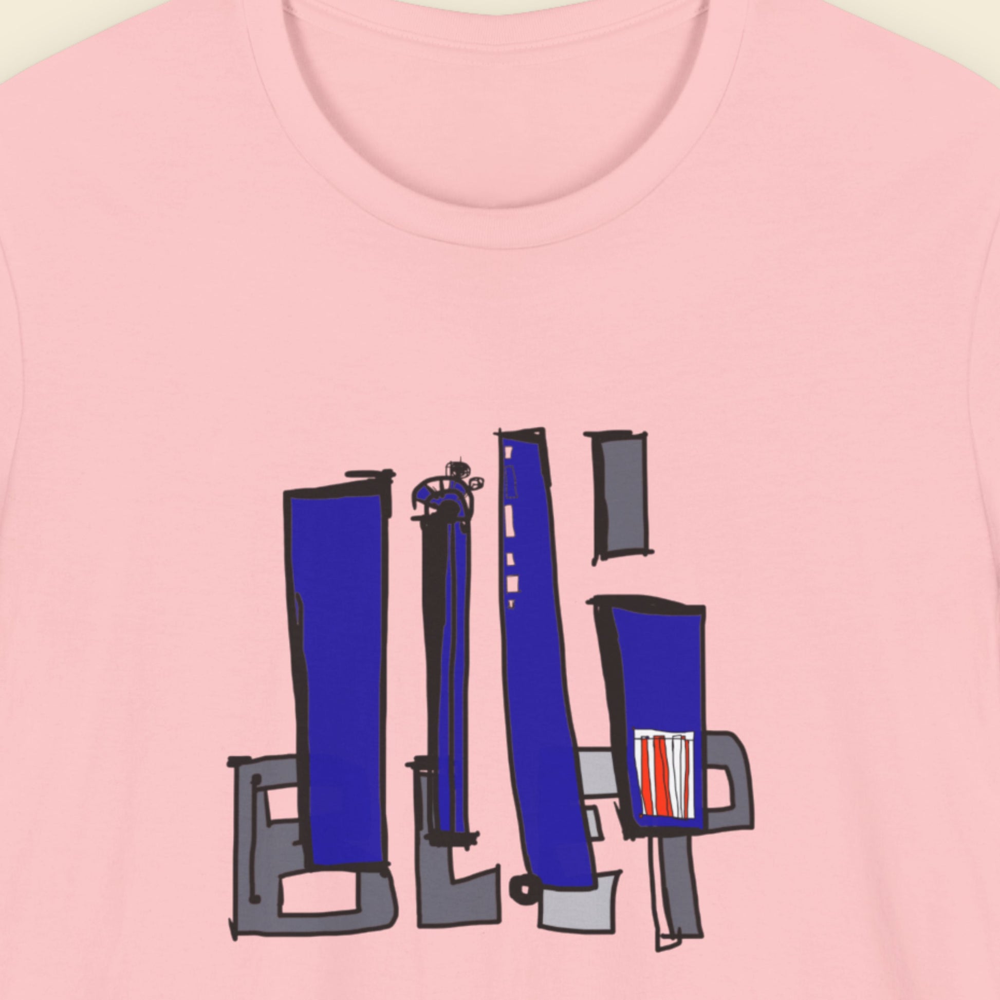 Pink t-shirt with blue and black graphic design on a plain background.
