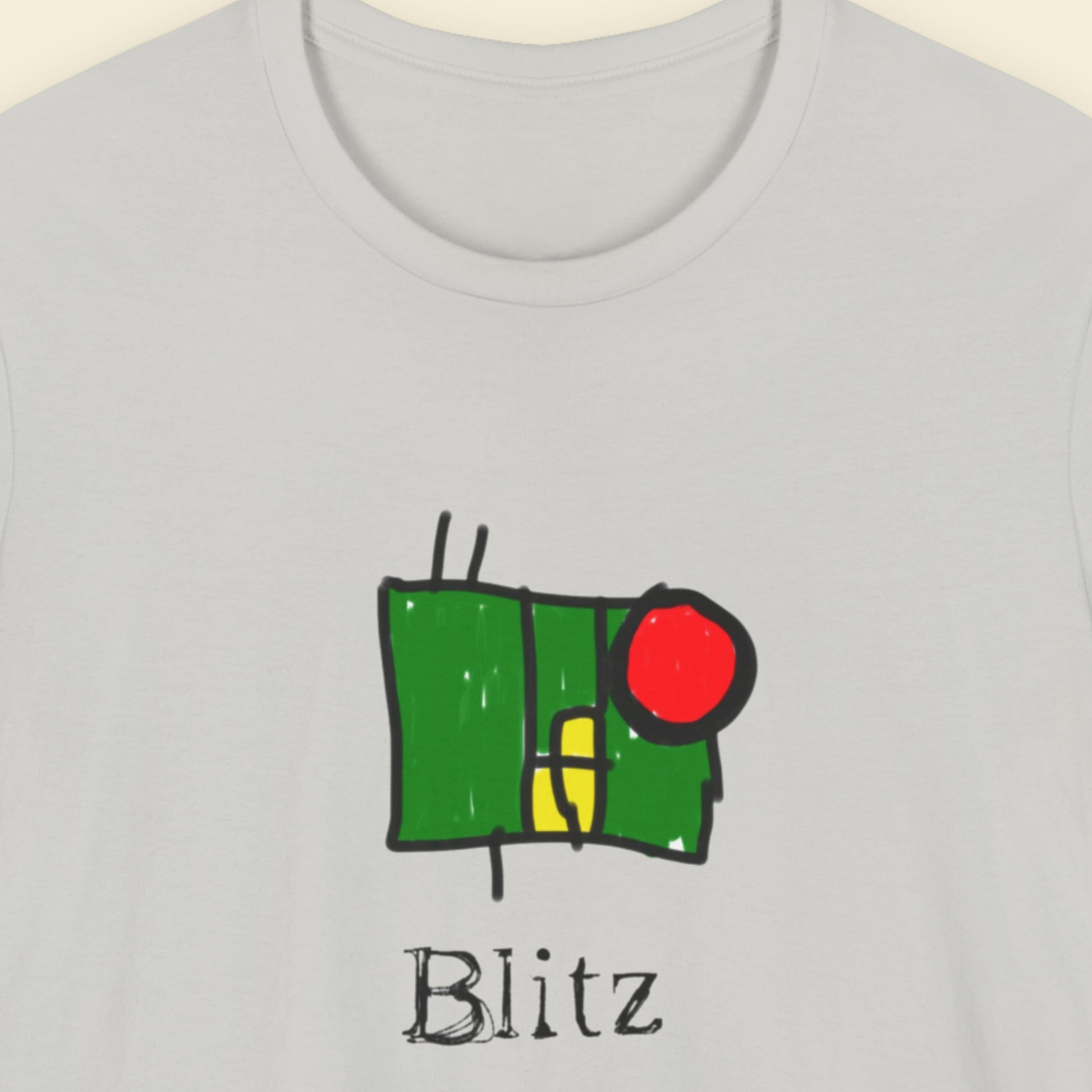 Gray t-shirt with a green and red traffic light design and the word 'Blitz' on a beige background.