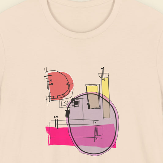 Beige t-shirt with a colorful abstract drawing on a beige background.