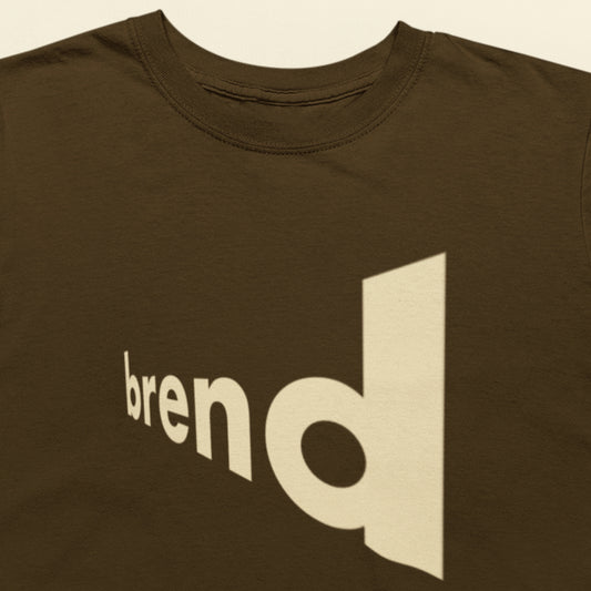 Brown shirt with extreme angled text name of brend