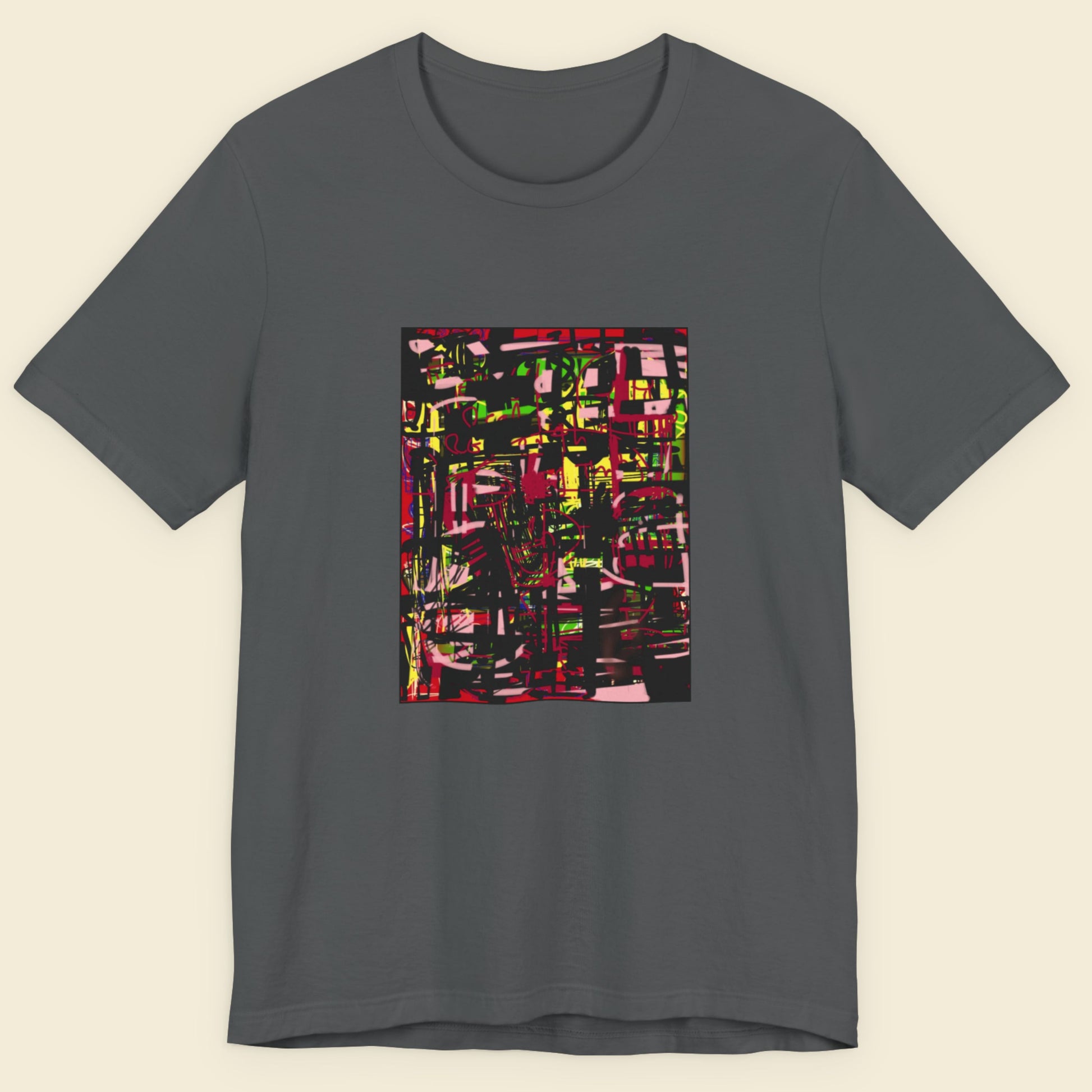 Grey t-shirt with a colorful abstract drawing on a beige background.