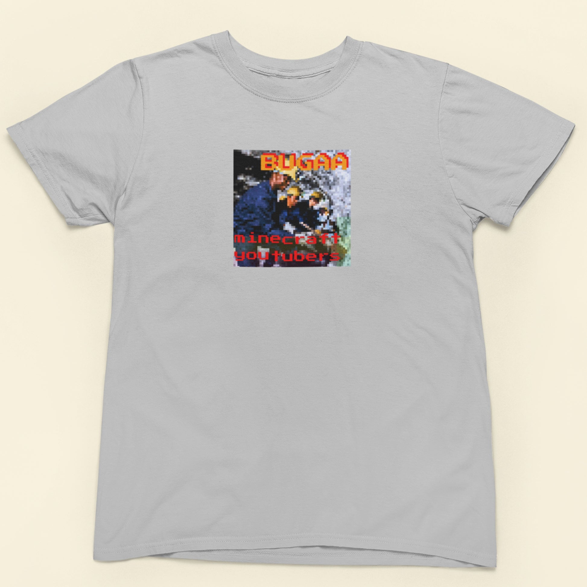 Gray t-shirt with a graphic design on a beige background