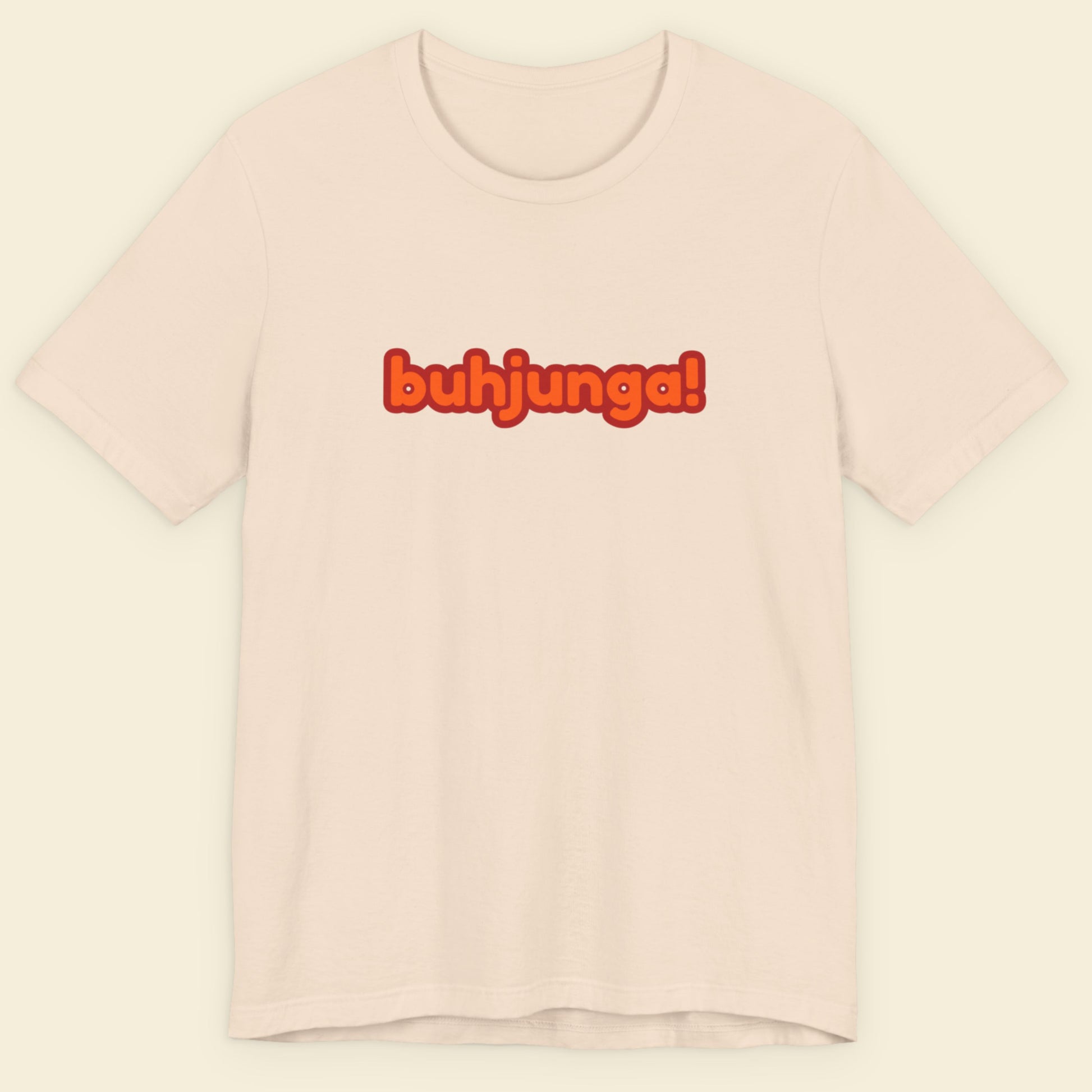 Beige t-shirt with multicolored 'buhjunga!' text on a beige background.