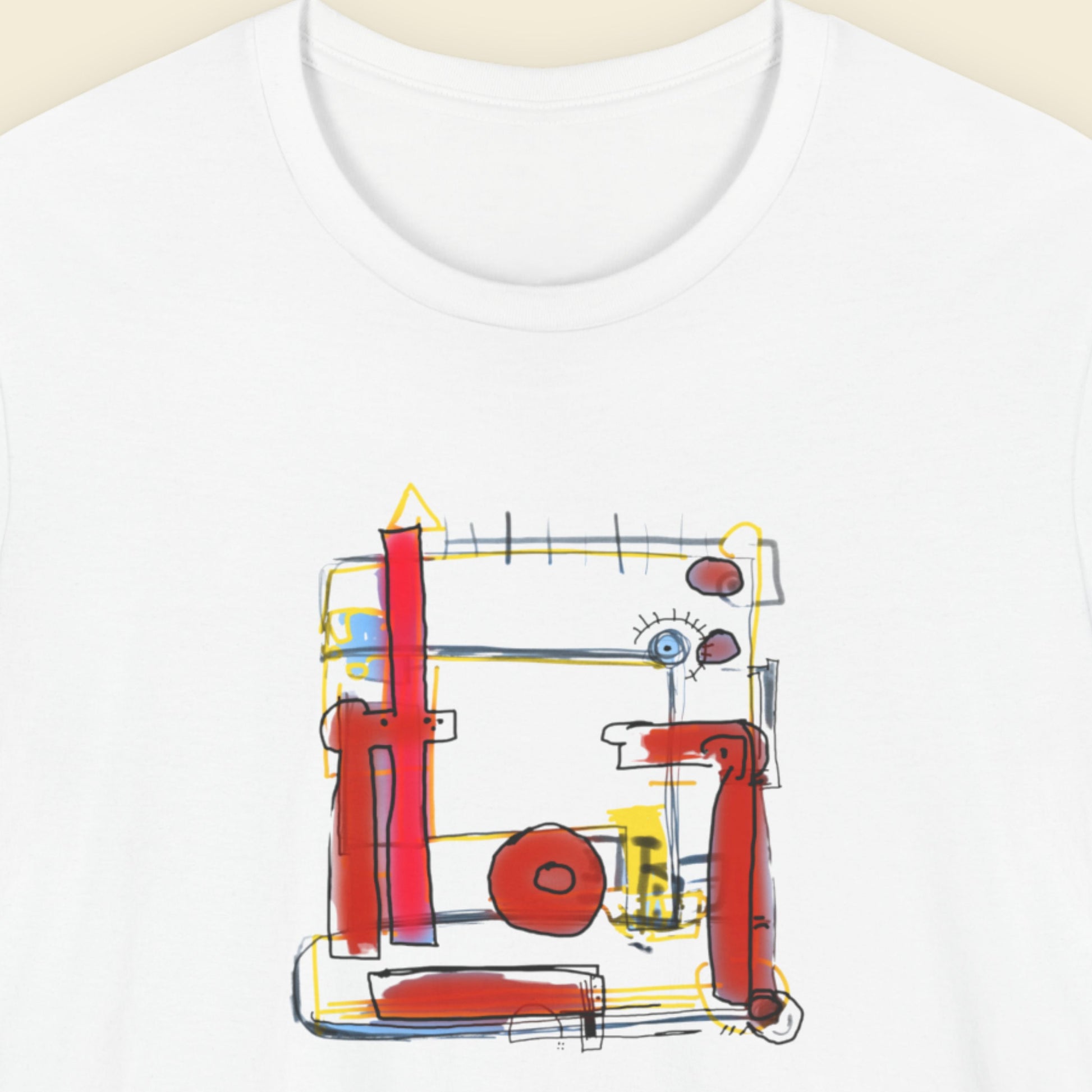 White t-shirt with a colorful abstract drawing on a beige background.
