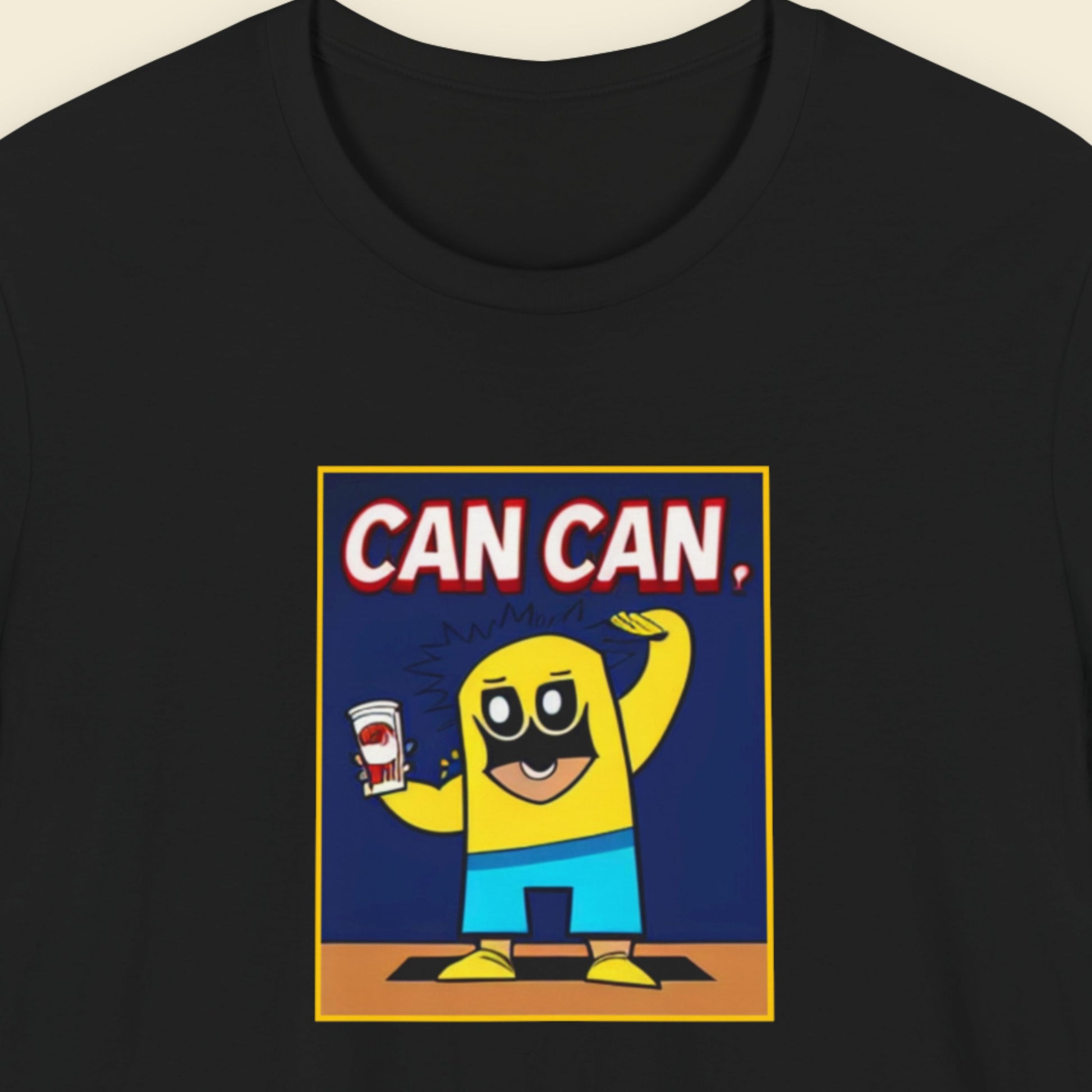 Black t-shirt with a cartoon character and 'CAN CAN' text on a blue background.