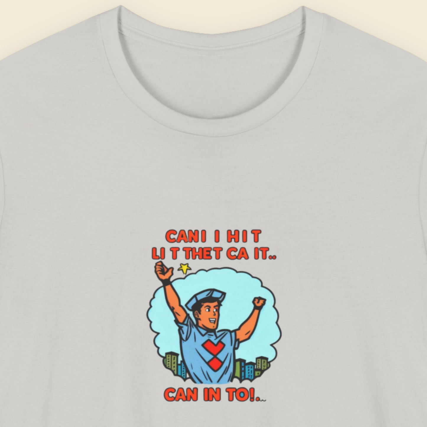 Light grey t-shirt with a fun, colorful crossing guard cartoon illustration on a beige background.
