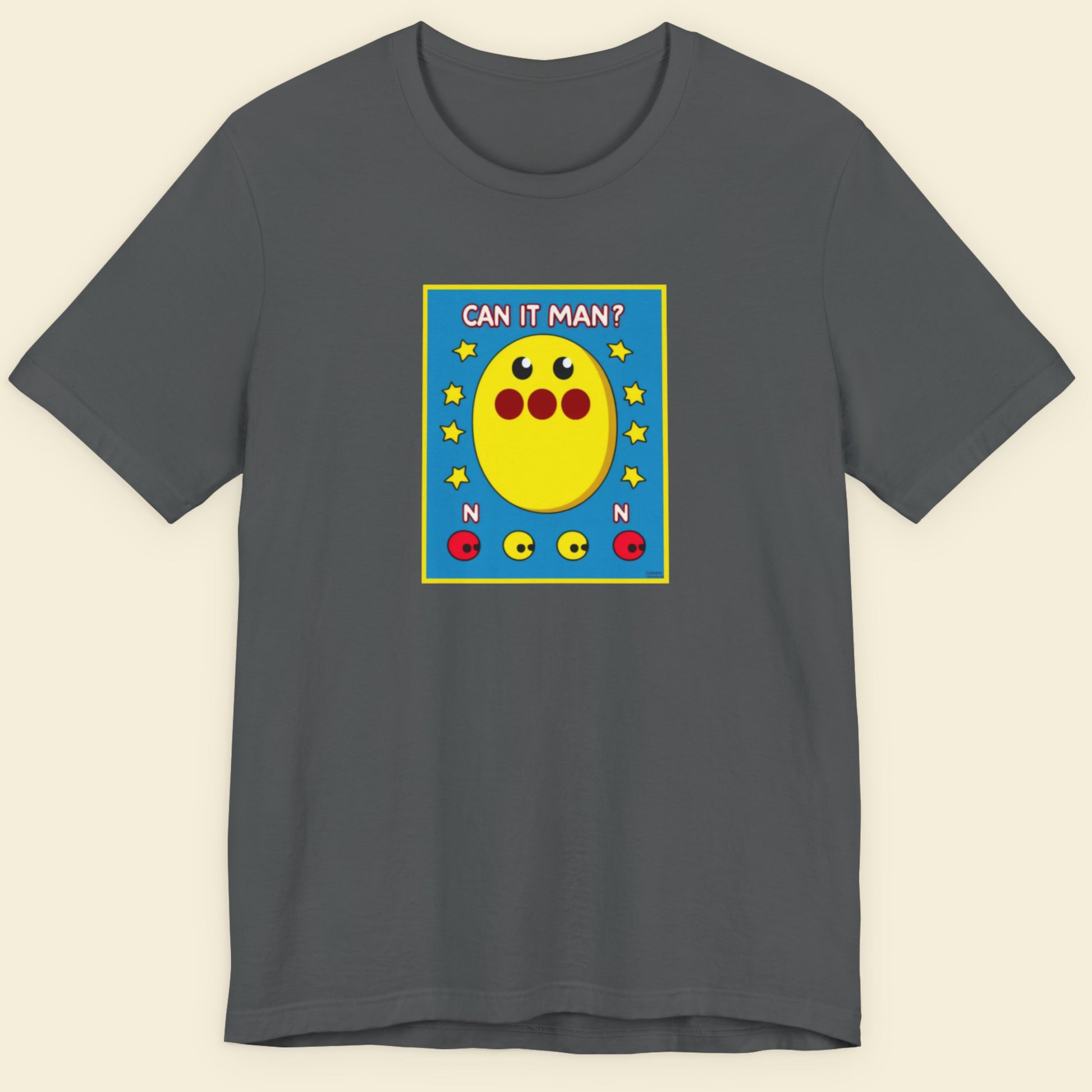 Gray t-shirt with a colorful graphic design on a beige background.