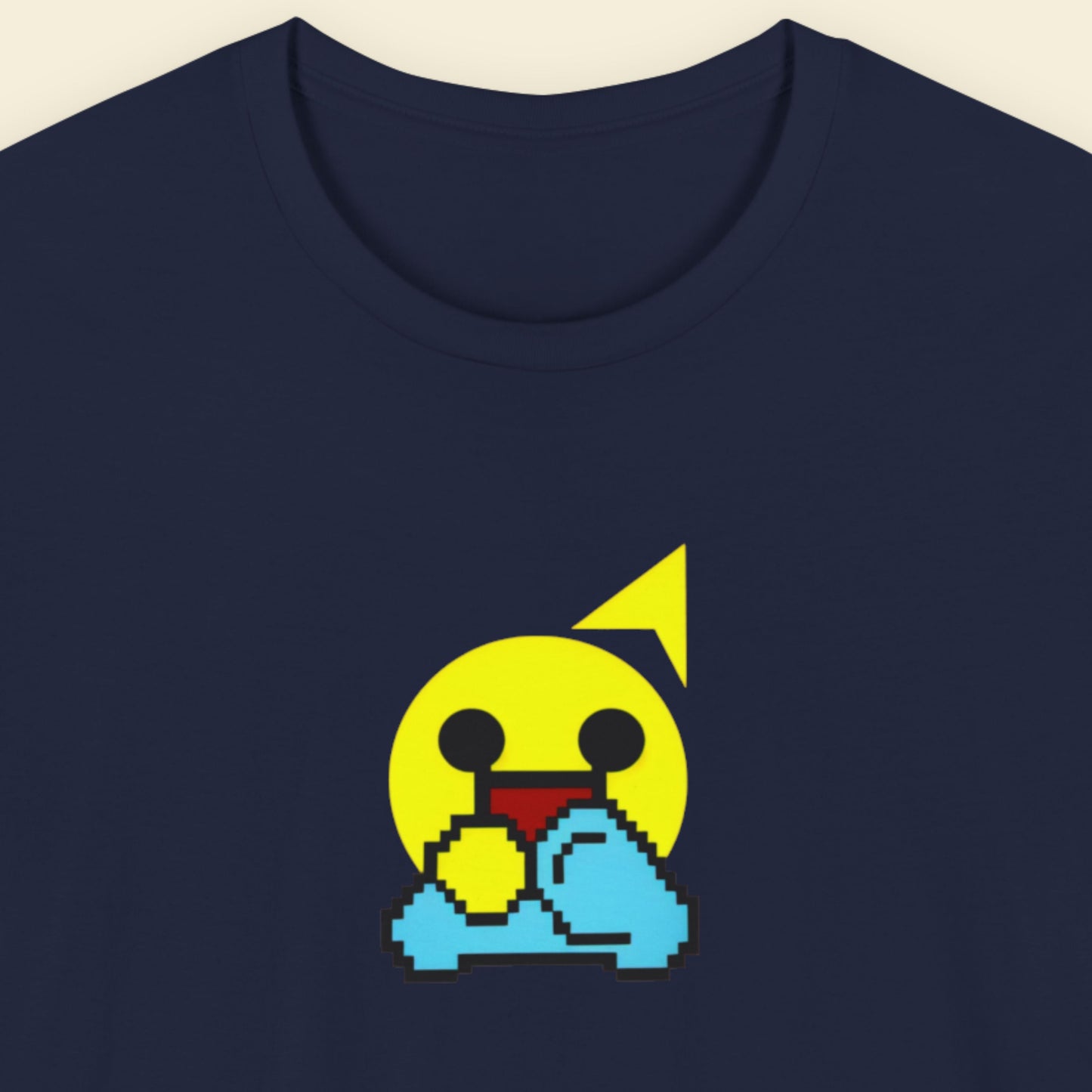 Navy blue t-shirt with a fun, colorful cartoon illustration on a beige background.