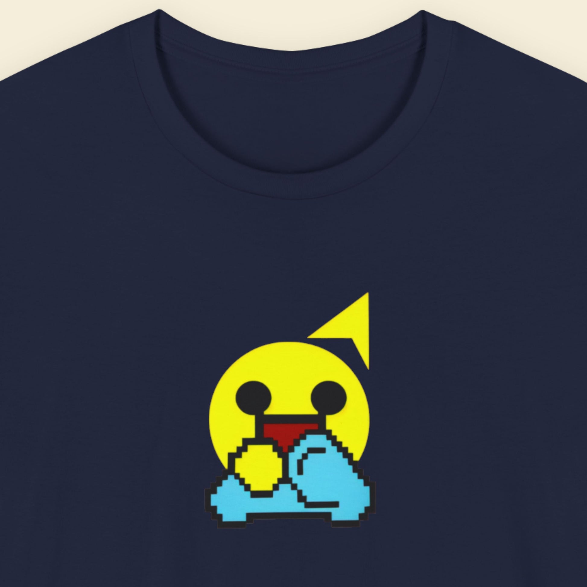 Navy blue t-shirt with a fun, colorful cartoon illustration on a beige background.