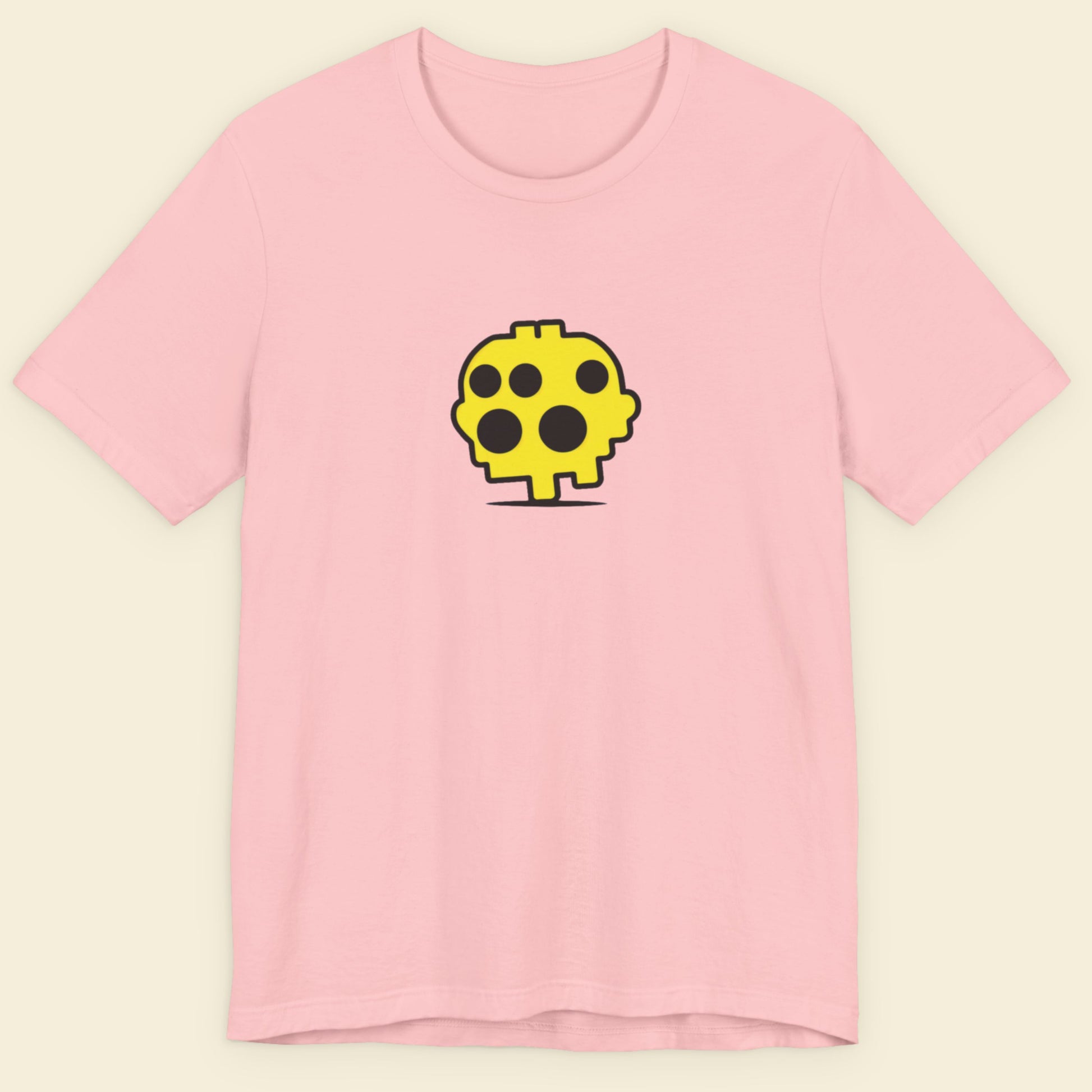 Pink t-shirt with a yellow and black graphic on a beige background.