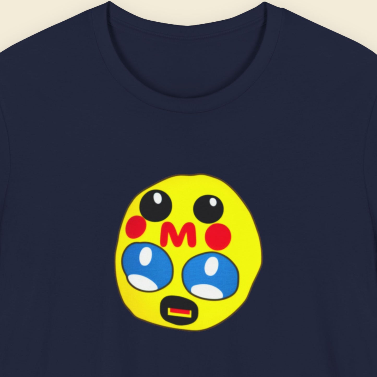 Navy blue t-shirt with a fun, colorful cartoon illustration on a beige background.