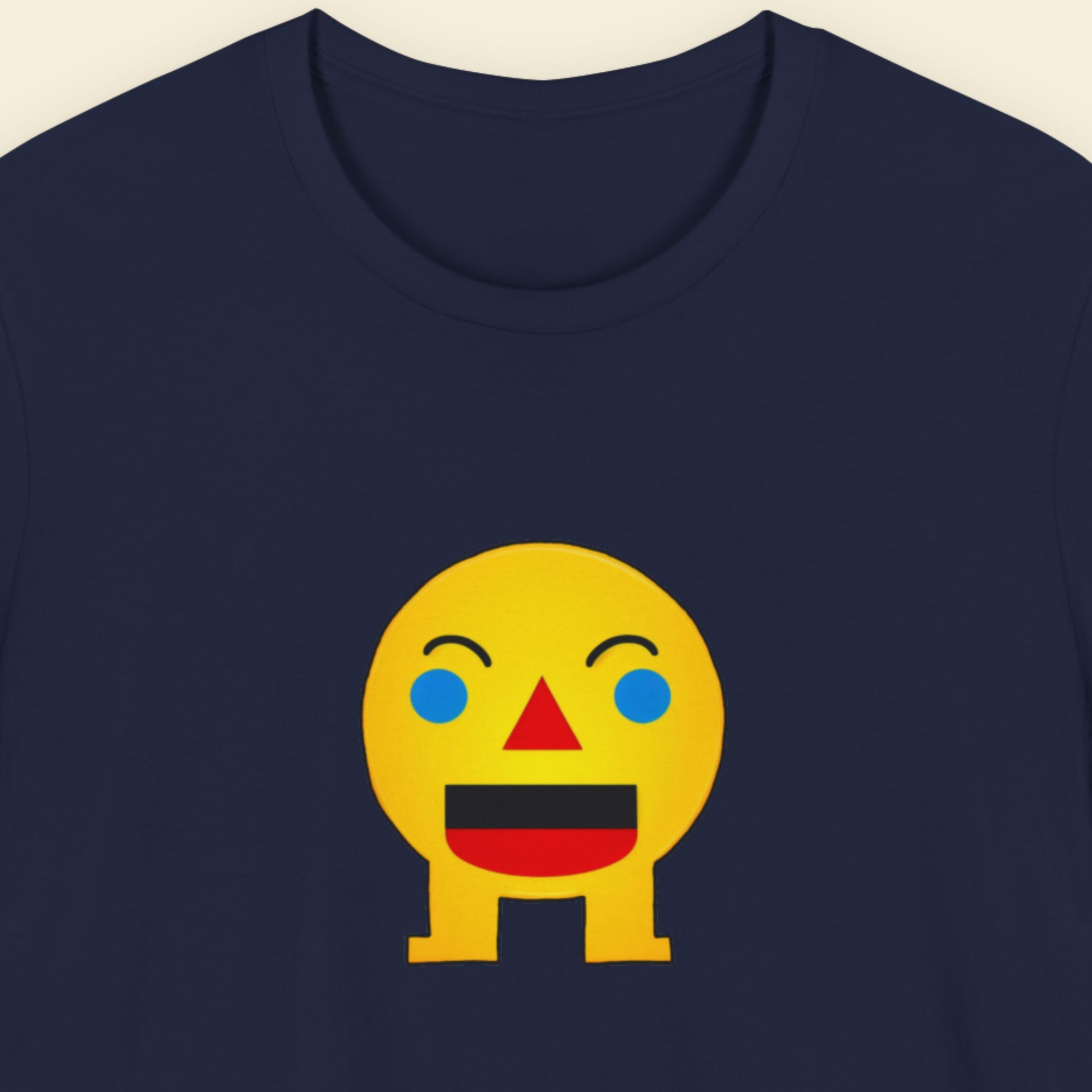 Navy blue t-shirt with a fun, colorful cartoon illustration on a beige background.