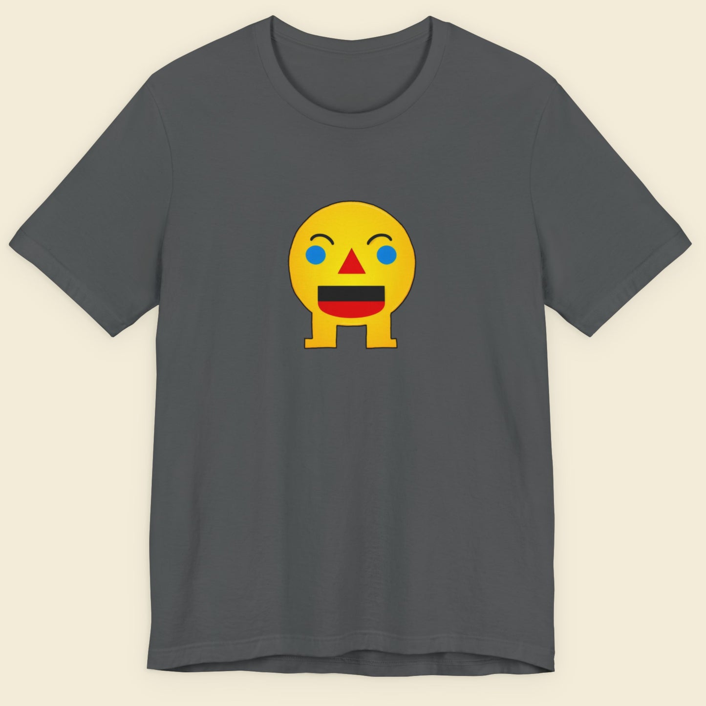 Grey t-shirt with a fun, colorful cartoon illustration on a beige background.