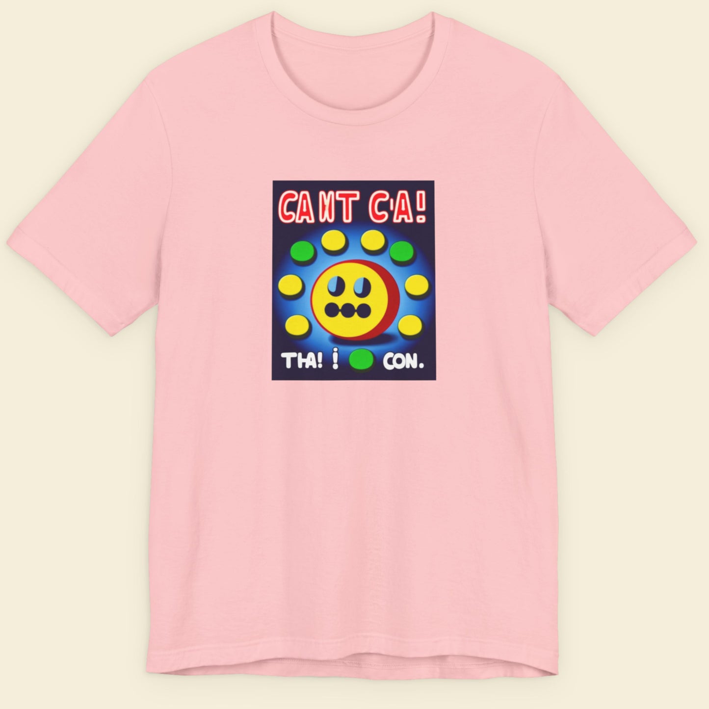 Pink t-shirt with a fun, colorful cartoon illustration on a beige background.