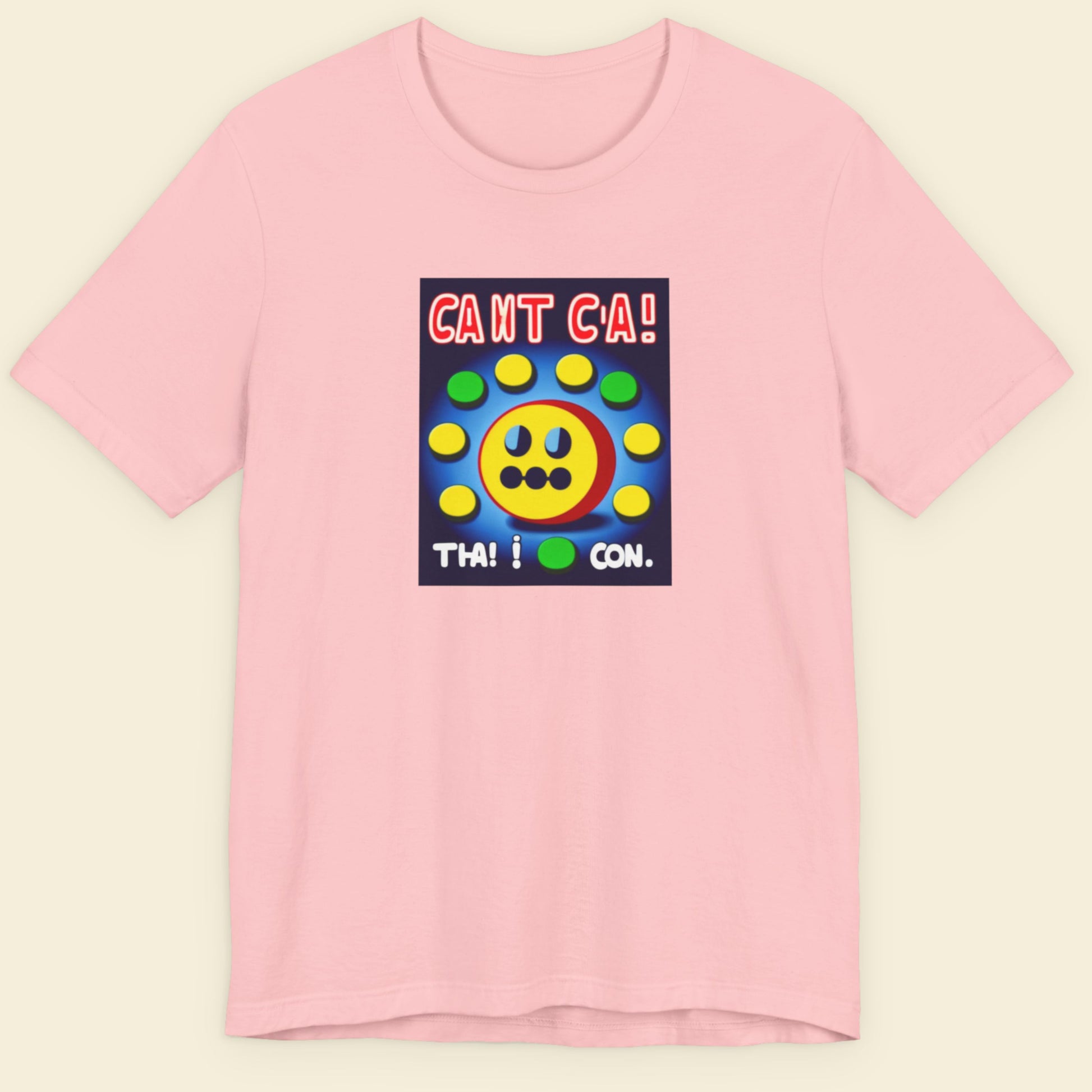 Pink t-shirt with a fun, colorful cartoon illustration on a beige background.
