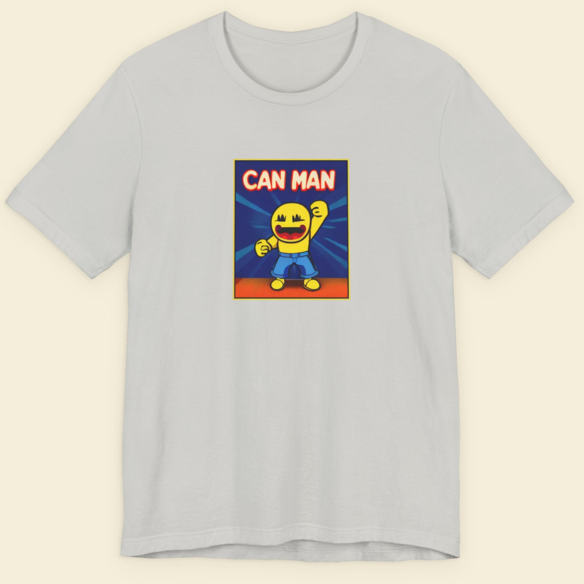 Grey t-shirt with a fun, colorful cartoon illustration on a beige background.