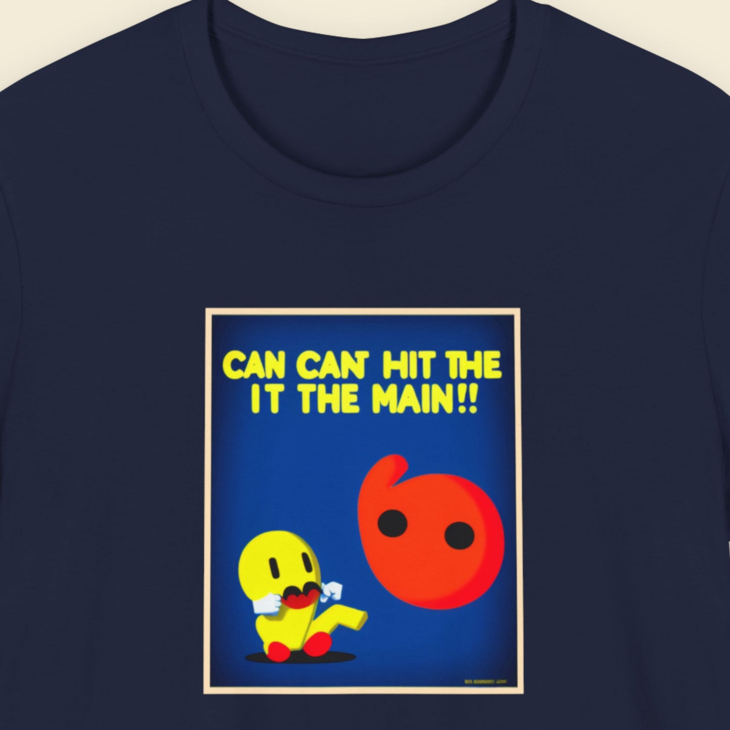 Navy blue t-shirt with a fun, colorful cartoon illustration on a beige background.