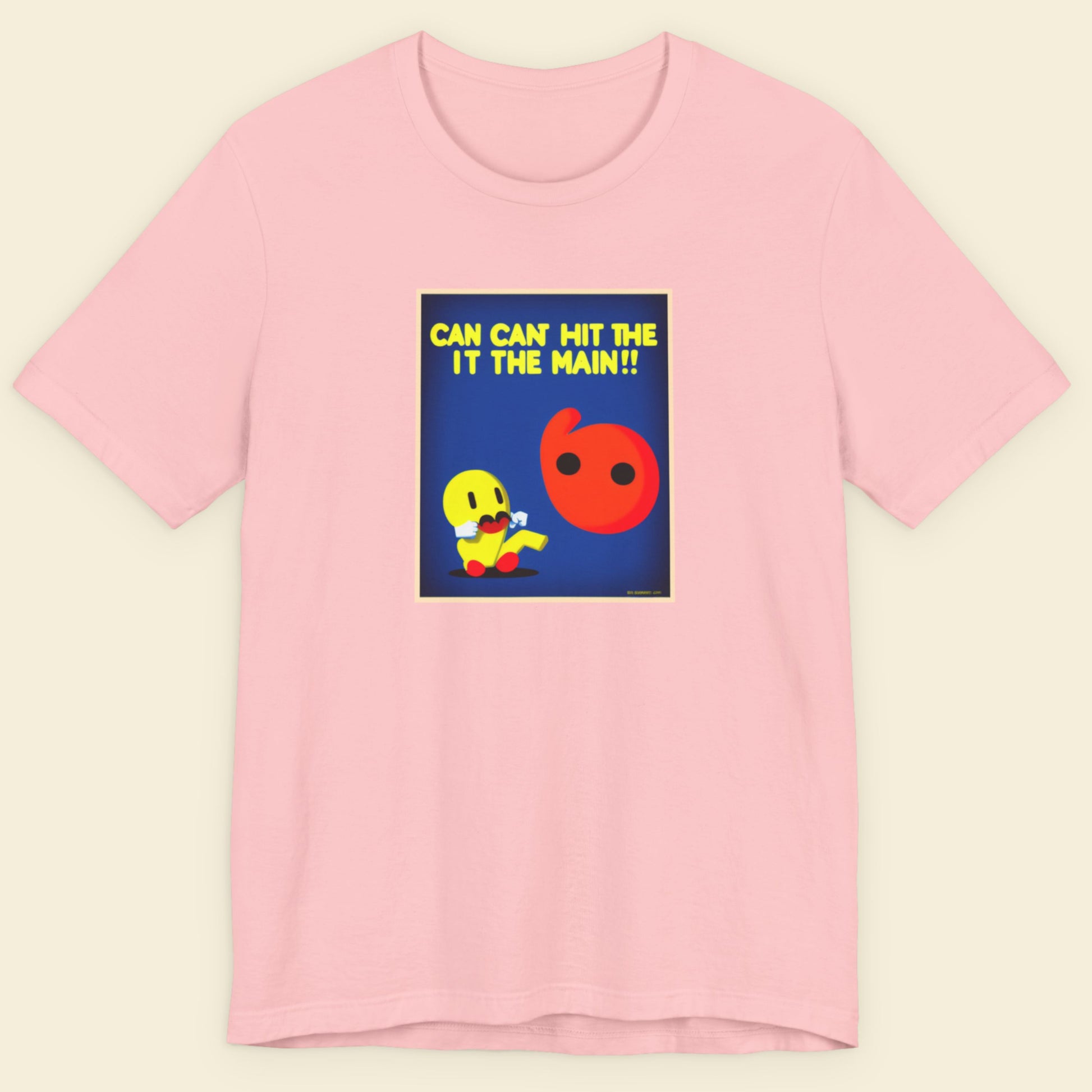 Pink t-shirt with a colorful graphic and text on a beige background.