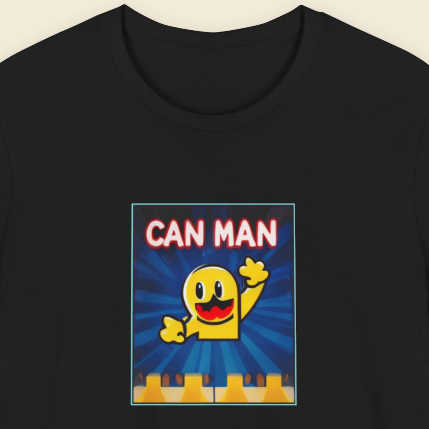 Black t-shirt with a fun, colorful cartoon illustration on a beige background.
