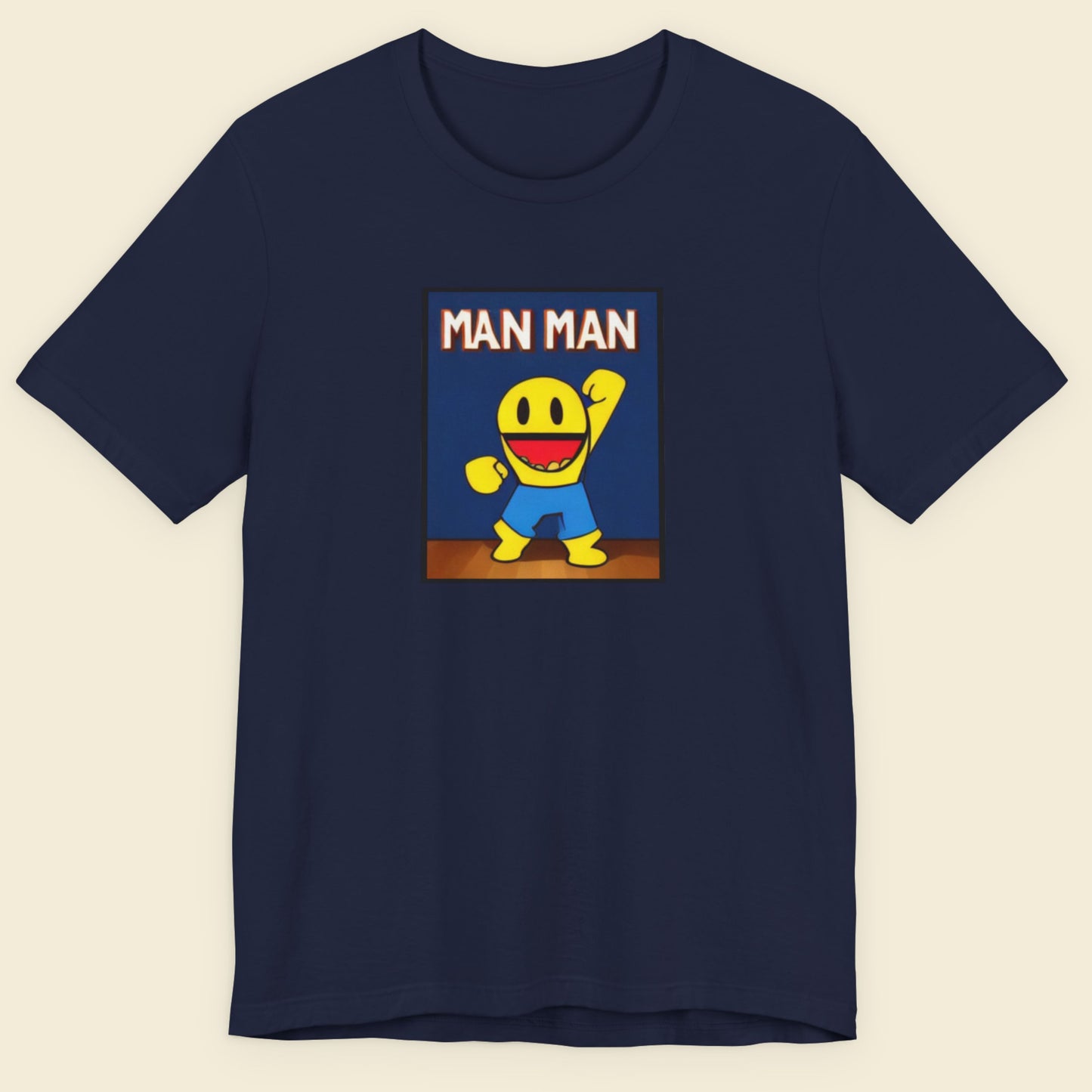 Navy blue t-shirt with a cartoon character graphic on a beige background.